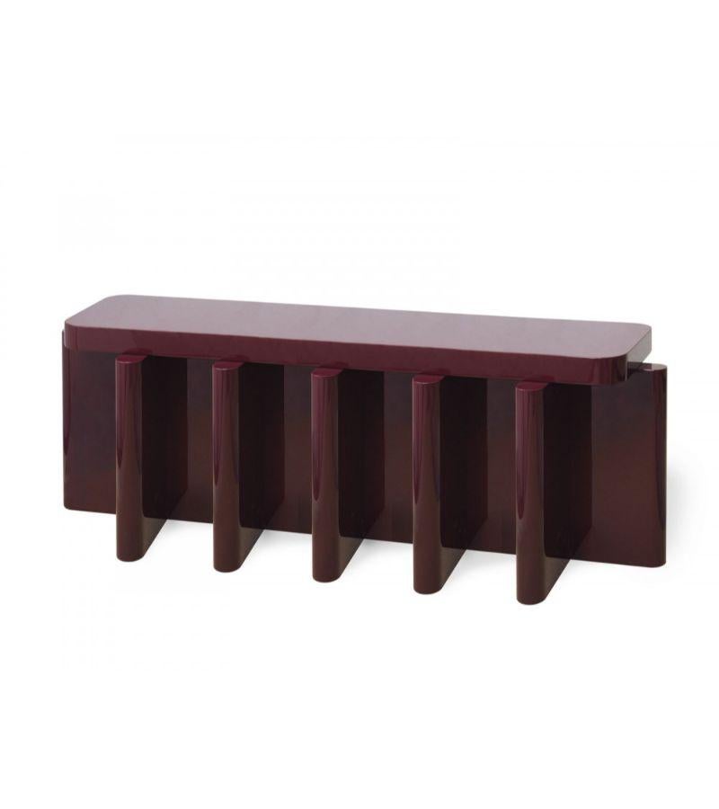 Spina B5.1 bench by Cara Davide
Dimensions: D 130 x W 40 x H 45 cm 
Materials: Solid nut wood, lacquered MDF. 
Also available in colors: Bordeaux, caramel, dusty red, off-white, and natural wood.


Spina is a collection of lacquered tables and