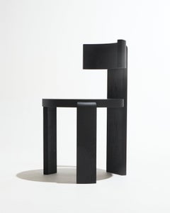 "Spina" chair in solid oak with black-stained finish