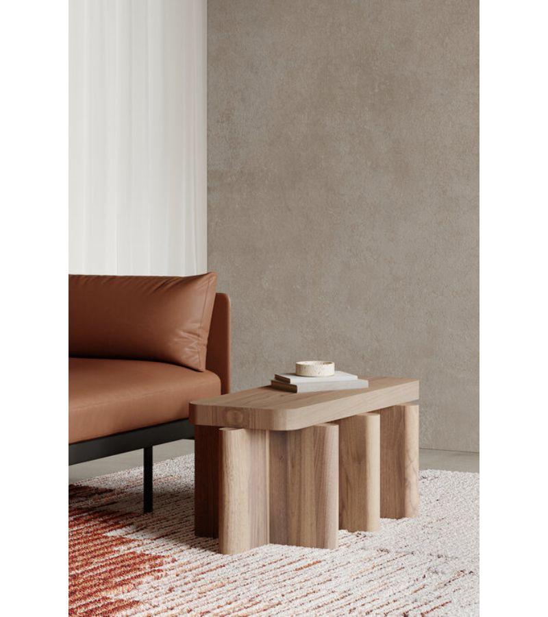Spina T3.2 bench by Cara Davide
Dimensions: D 85 x W 40 x H 45 cm 
Materials: solid nut wood, lacquered MDF. 
Also available in colors: bordeaux, caramel, dusty red, off-white, and natural wood.


Spina is a collection of lacquered tables and