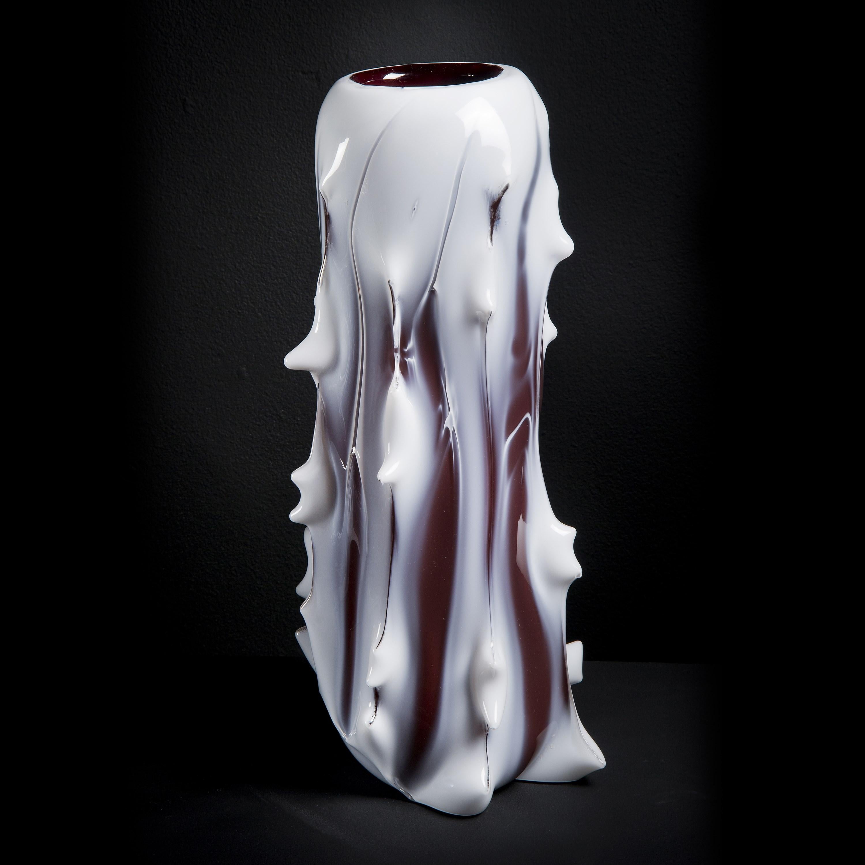 ‘Spinal I' is a limited edition (ed 49) tree-inspired white & aubergine glass vase by the Swedish artist, Mårten Medbo.

Among his work, there are numerous examples of pieces having a resemblance to anthropomorphic or biomorphic structures, without