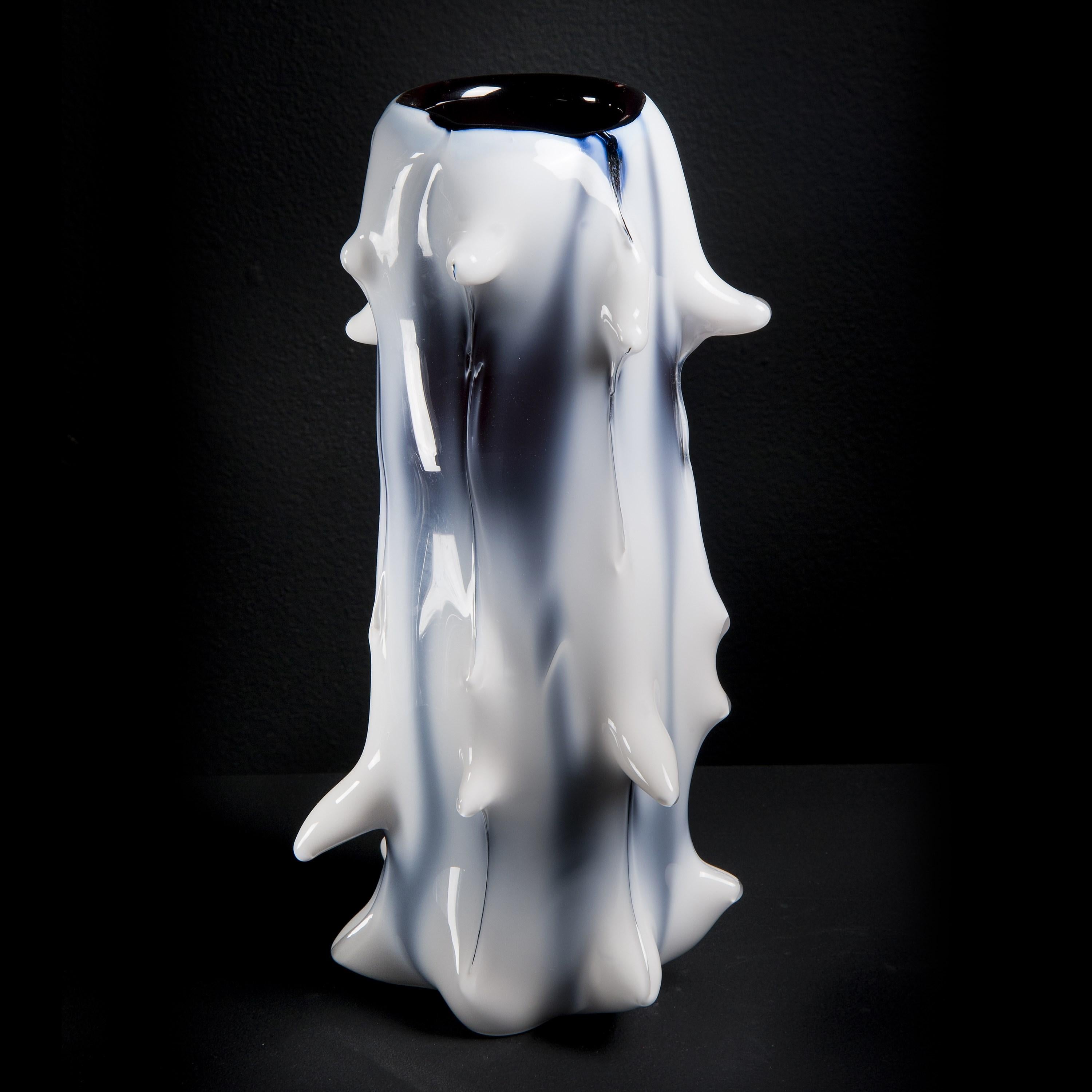 ‘Spinal II' is a limited edition (ed 49) tree-inspired white & aubergine glass vase by the Swedish artist, Mårten Medbo.

Among his work, there are numerous examples of pieces having a resemblance to anthropomorphic or biomorphic structures, without
