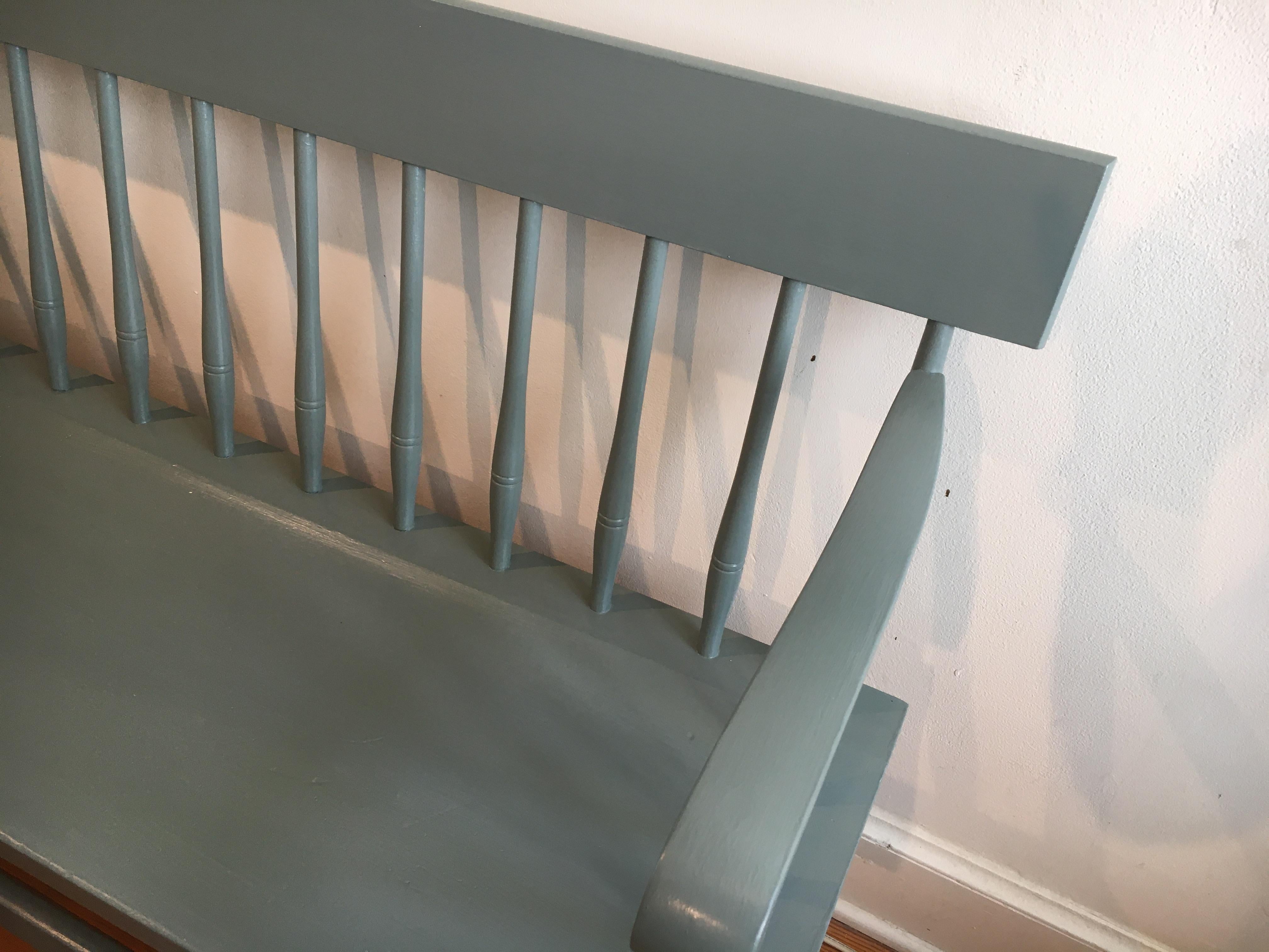 this American Spindle back bench was bought from a home in Southern Vermont , with later paint. It is in excellent condition and very comfortable. The soft green color is a significant plus. this would look great in a hallway, mudroom etc.