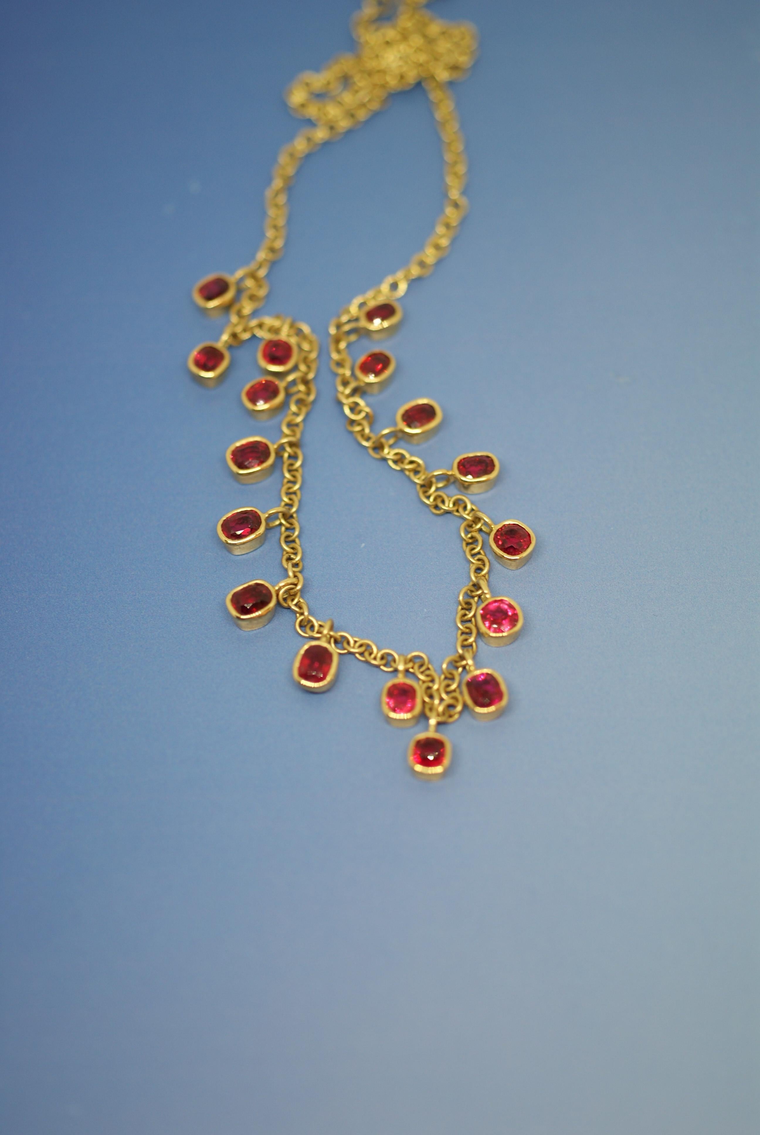 Designed as a fringe of cushion-cut spinel, suspended from an 18K gold circular link necklace

Description:
Gem materials: 17 cushion-cut spinels weighing approximately 6.98 cts., all from Burma and all natural.