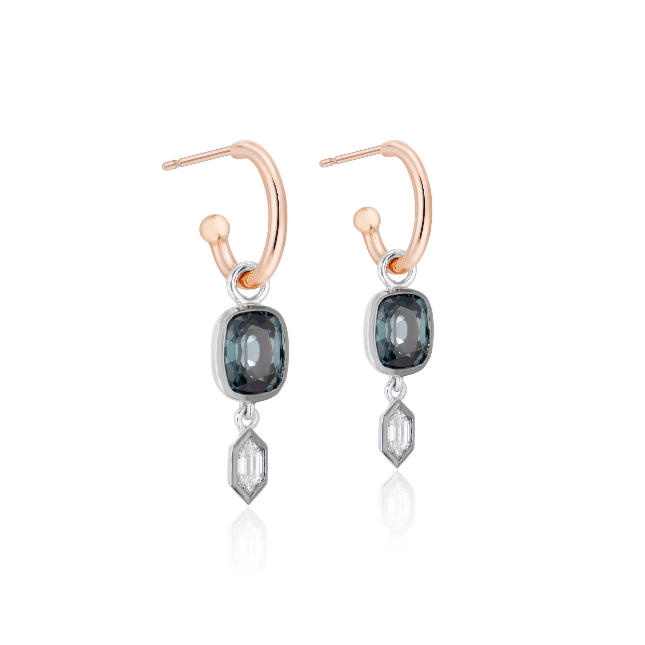 Our signature Esti Hoop Earrings are fun and versatile. You can mix and match hoops, order custom charms, or wear them as pendants.

Each charm contains a cushion-cut teal color Burmese spinel and a hexagon-cut colorless diamond set in an 18K