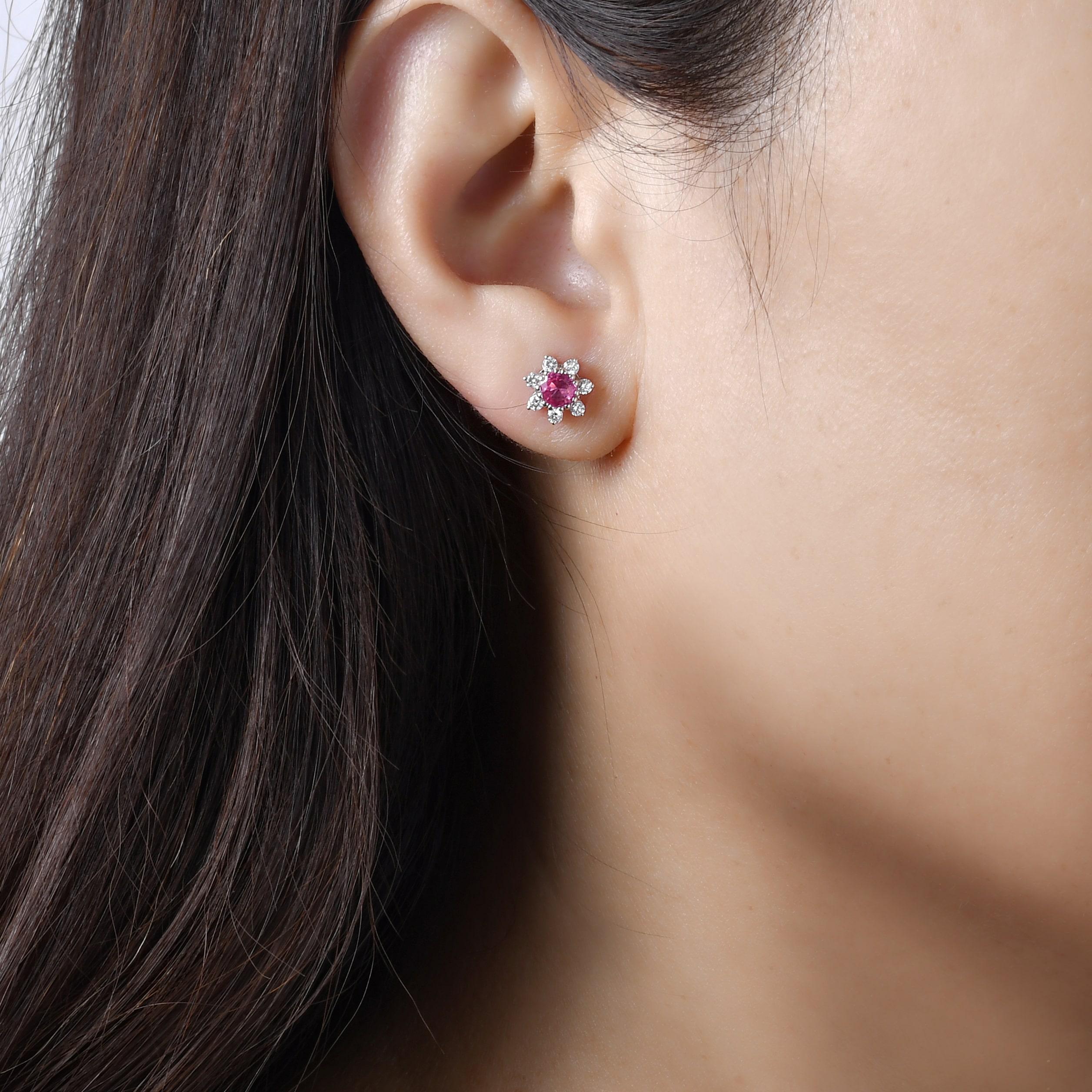 Indulge in luxury with our Spinel and Diamond Pendant. Handcrafted with 18K white gold, these stud earrings showcases a pair of stunning raspberry spinel surrounded by sparkling VS quality diamonds. Elevate your style with this high-quality gemstone