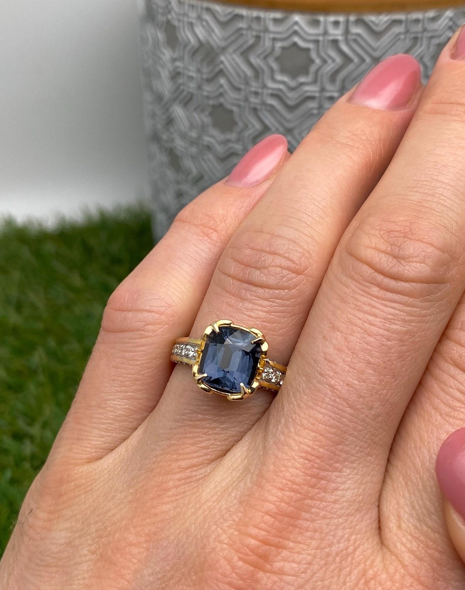Natural Spinel and Diamonds gemstone
Solid 14 Karat Yellow Gold Ring

Laboratory full certificate for the ring.
Spinel have own certificate GFCO
Main Stone: Spinel
Main Stone Creation: Natural
Main Stone Color: Blueish Violet
Main Stone Origin: