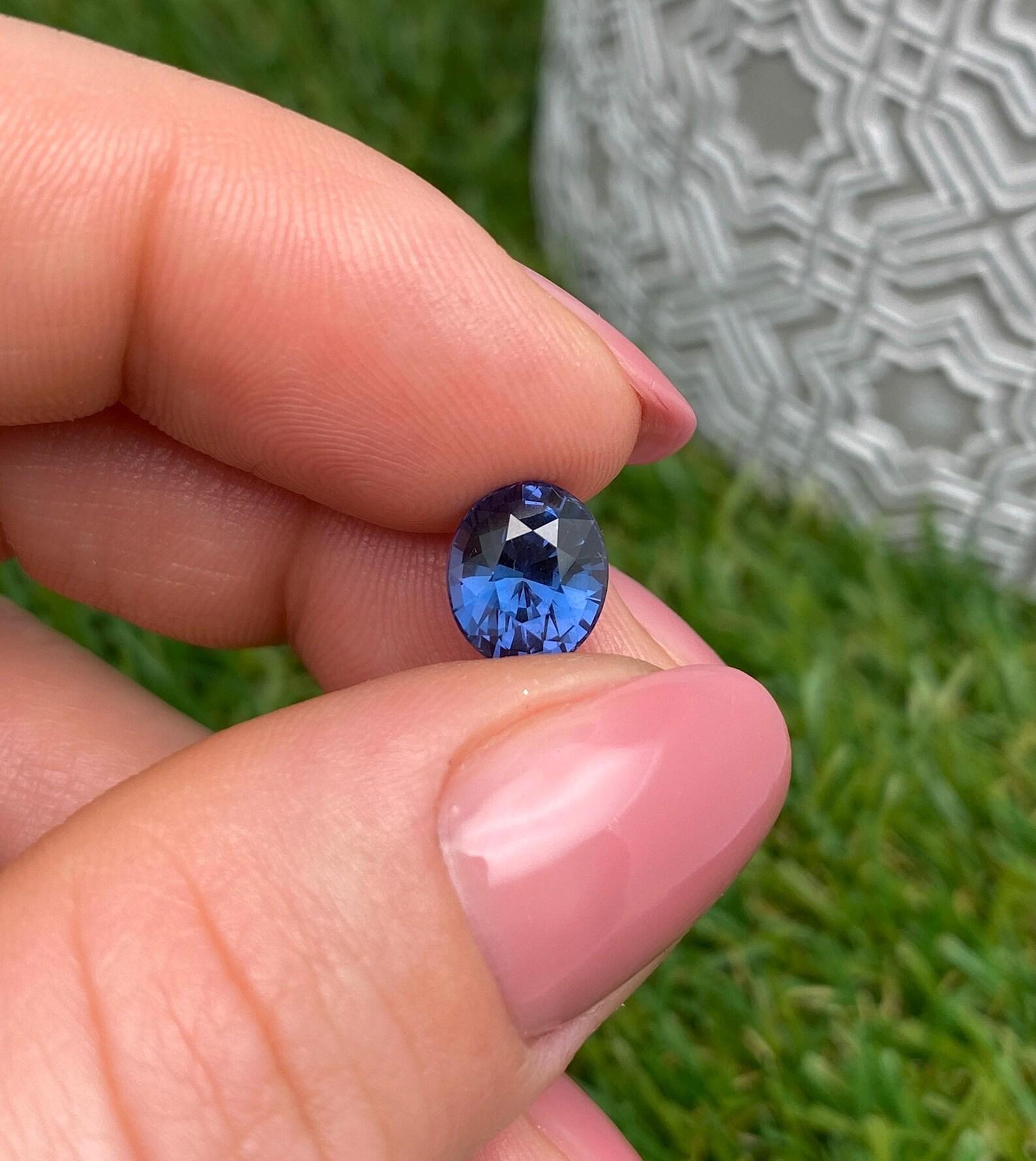 Natural Cobalt Blue Spinel gemstone from Tanzania!

GFCO Laboratory certified
Gemstone Color: VIVID Blue
Gemstone Type: Spinel
Gemstone size: 9.02x7.71x5.91mm
Cut Grade: Very Good
Clarity/Grade: VS
Gemstone Shape: Oval Cut
Gemstone Creation: