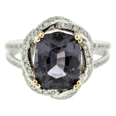 Anello in oro con diamante e spinello