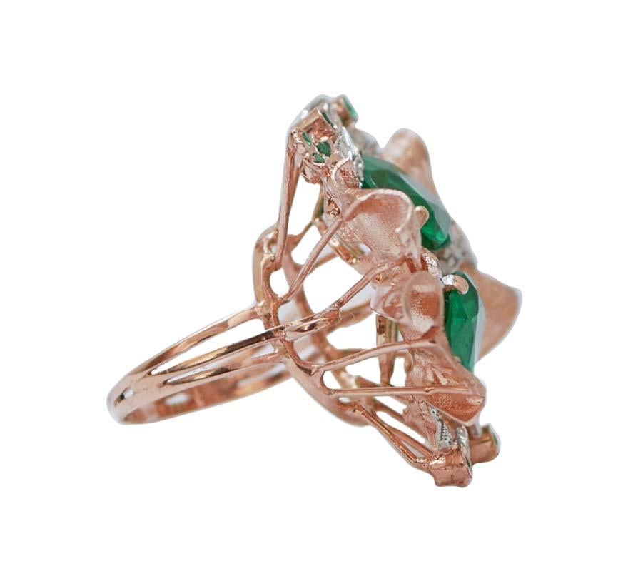 Modischer Ring aus 9-karätigem Roségold und Silberstruktur mit zwei herzförmigen hydrothermalen Spinellen in der Mitte, umgeben von diamantbesetzten Blättern und einer Blume mit kleinen Spinellen.
Dieser Ring wurde vollständig von italienischen