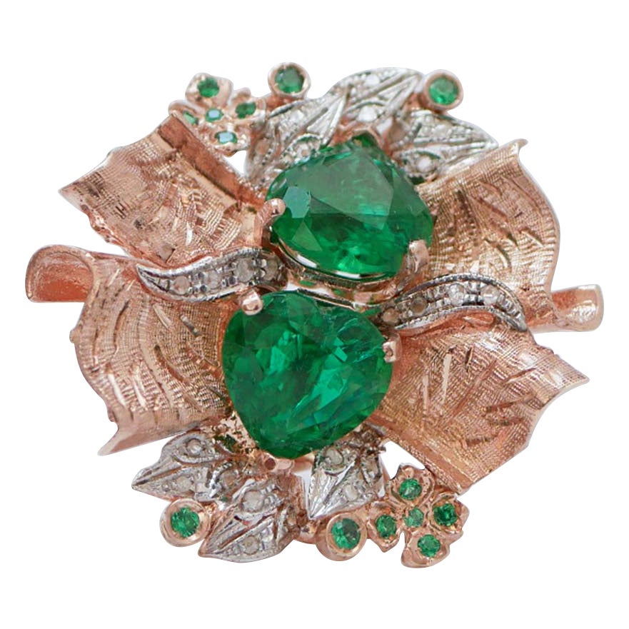 Anello con spinello, diamanti, oro rosa e argento.