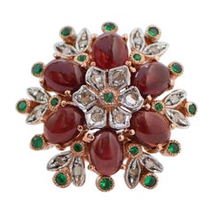 Anello con spinello, granati, diamanti, oro rosa e argento.