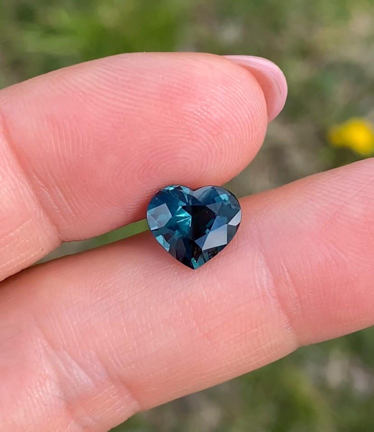 Natural Green-Blue Spinel gemstone

Laboratory certified GFCO
Gemstone Color: Vivid Green-blue/Blue-green
Gemstone Type: Spinel
Gemstone size: 8.38x9.48x5.46 mm
Cut Grade: Very Good
Clarity/Grade: VS
Gemstone Shape: Heart Cut
Gemstone Creation: