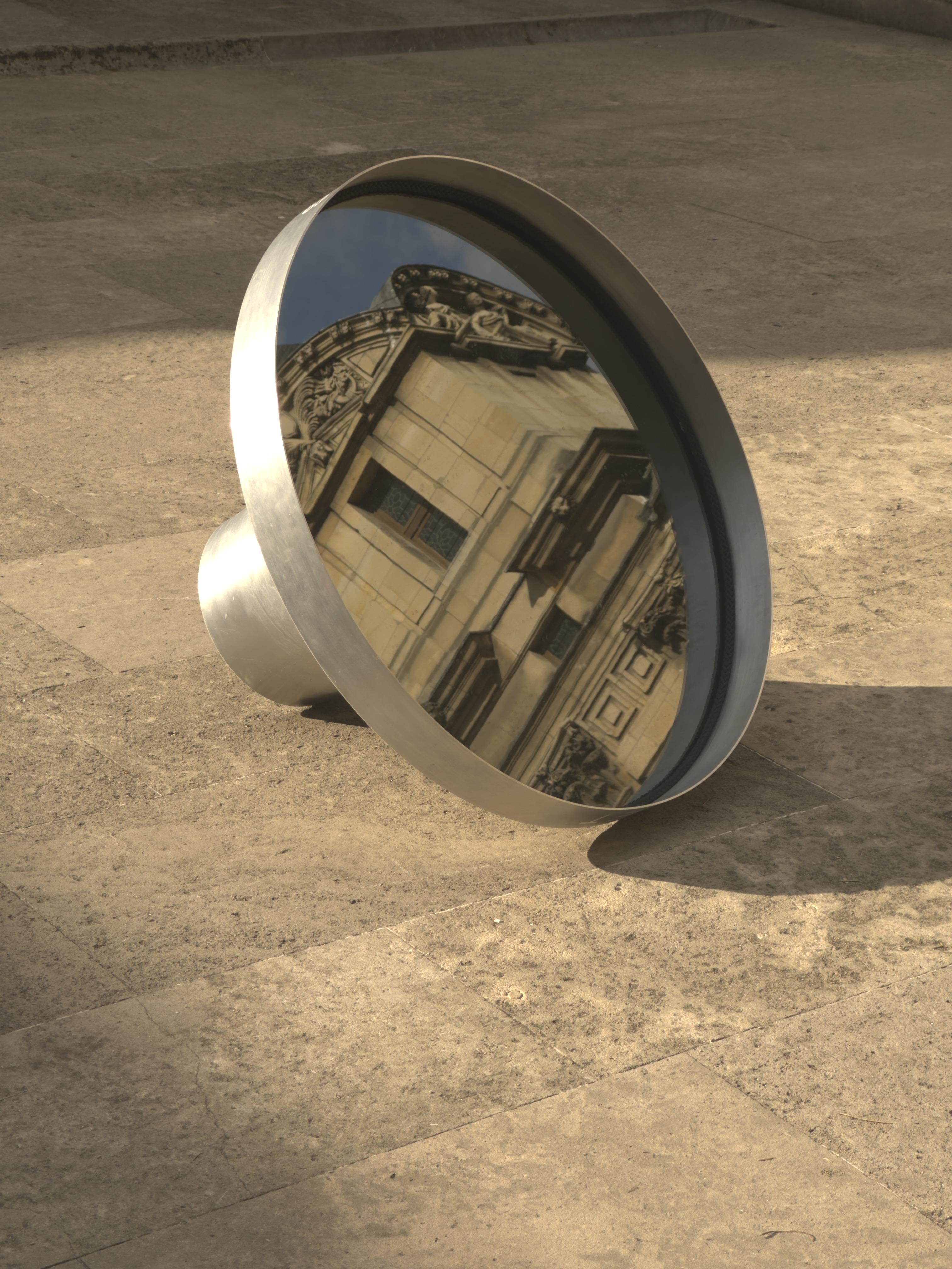 Spinning Mirror by Sophia Taillet
Dimensions: D 49 x W 79 x H 79 cm.
Materials: Raw aluminum and mirror.

Sophia Taillet is a designer, who graduated from the Ecole Nationale des Arts Décoratifs in Paris and SVA New York, USA.

She focuses on the