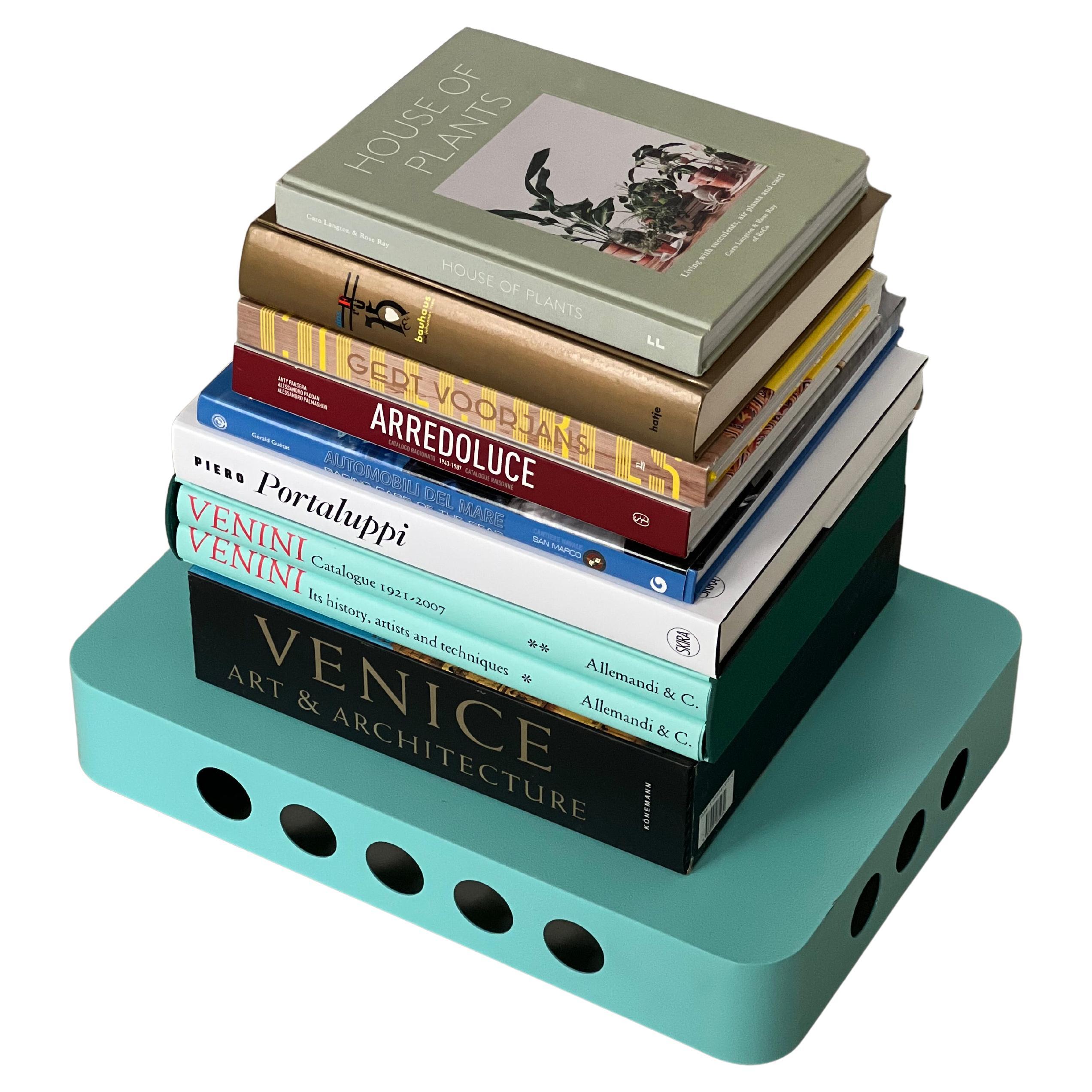 Tablero de libros Spinzi con ruedas , contemporáneo y minimalista Estantería de libros Tyffany Blue