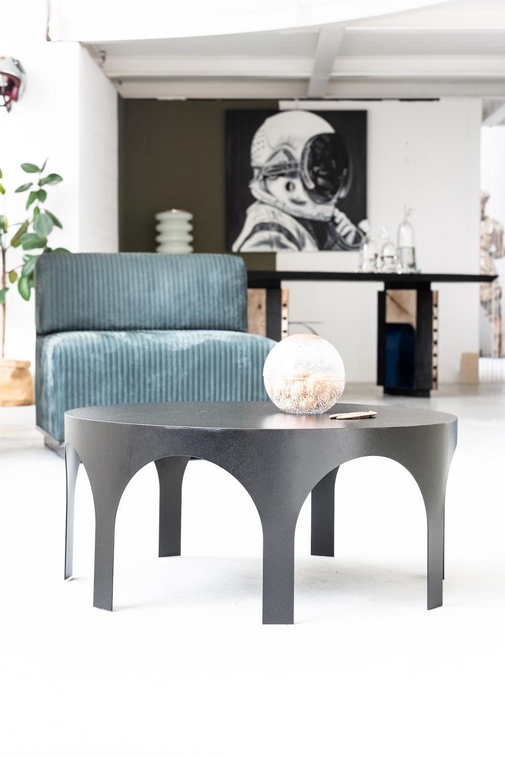 Round Metal Coffee table modern design 

Palladium is a collection by Milan-based studio Spinzi that celebrates the timeless elegance of Italian neoclassical architecture. The pieces own their name to Andrea Palladio, 16th century architect who