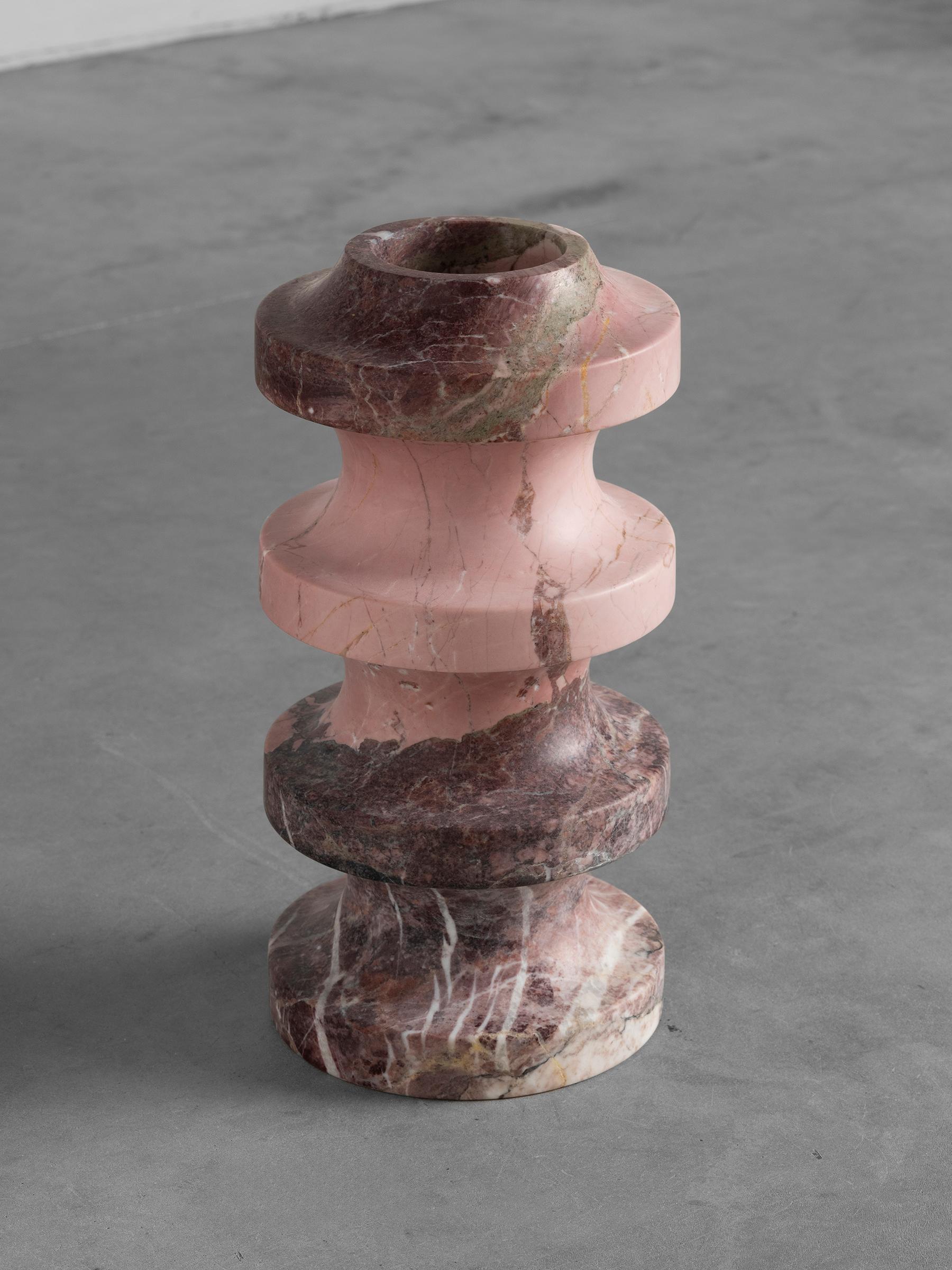 SPIRA is a modern tribute to ancient rituals. The 3 pieces repeat the motif of the ancient greek column base, in different proportions and use.

The variation of layers and colors in the texture of this extraordinary stone creates a captivating
