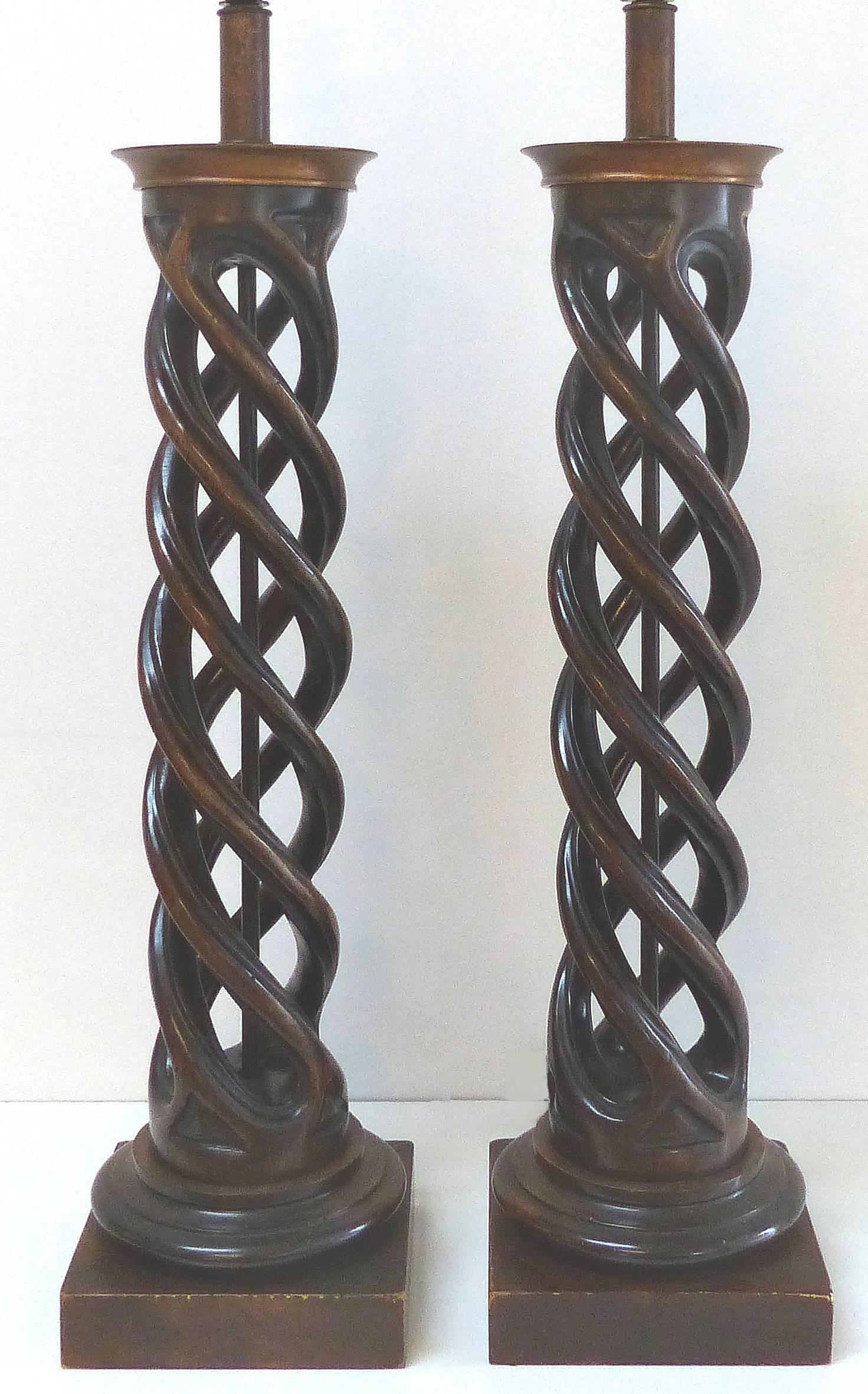 James Mont for Frederick Cooper Spiral Column Carved Wood Table Lamps, Pair

Offered for sale is a pair of hand-carved wooden double helix spiral column-form table lamps by James Mont lamps for Fredrick Cooper. The lamps are supported by 7