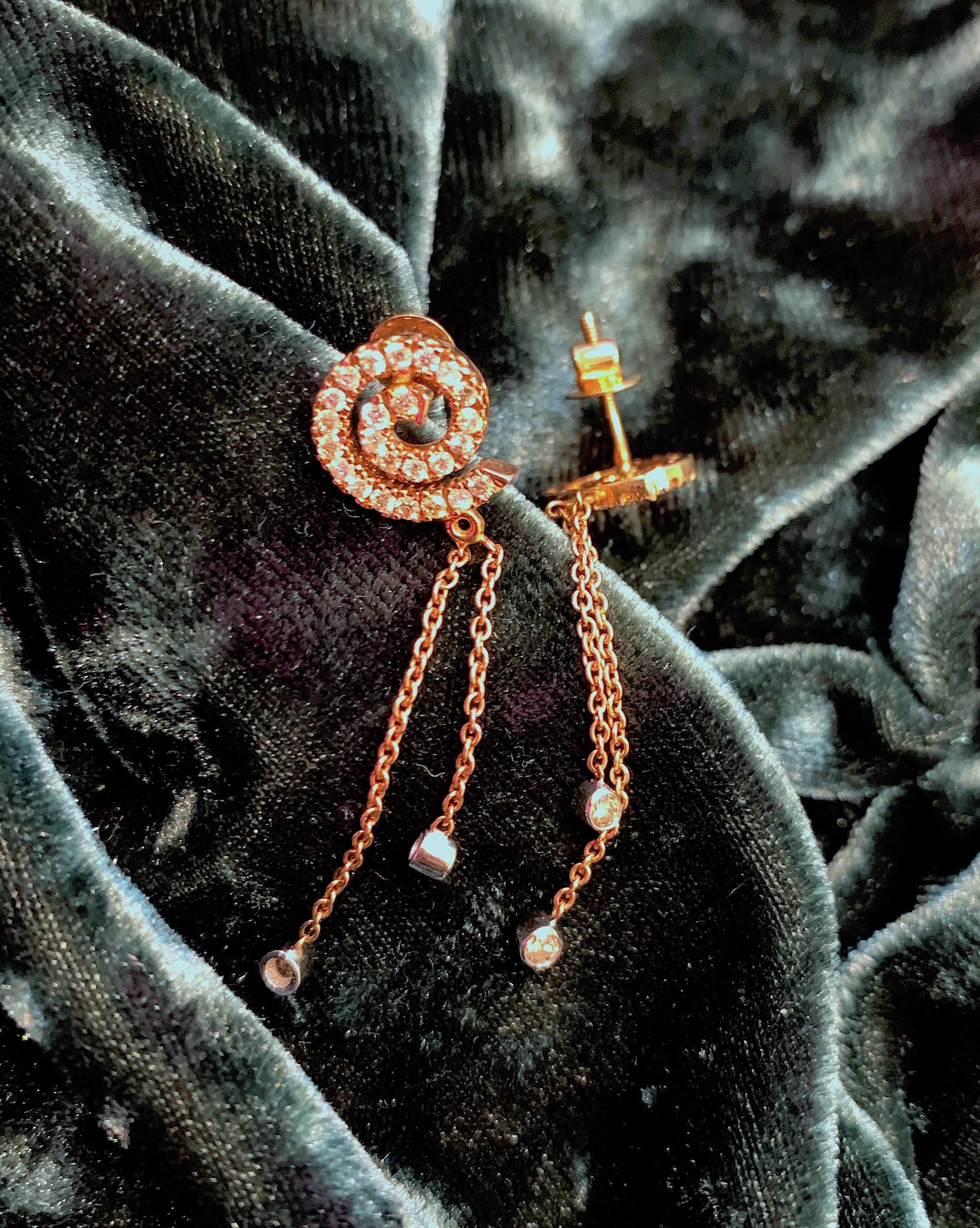 These Dazzling rose gold spiral diamond fringe earrings are set in fine 18k rose gold with diamond drops.
Most of our jewels are made to order, so please allow us for a 2-4 week delivery.
Please note the possibility of natural inclusions in gemstones