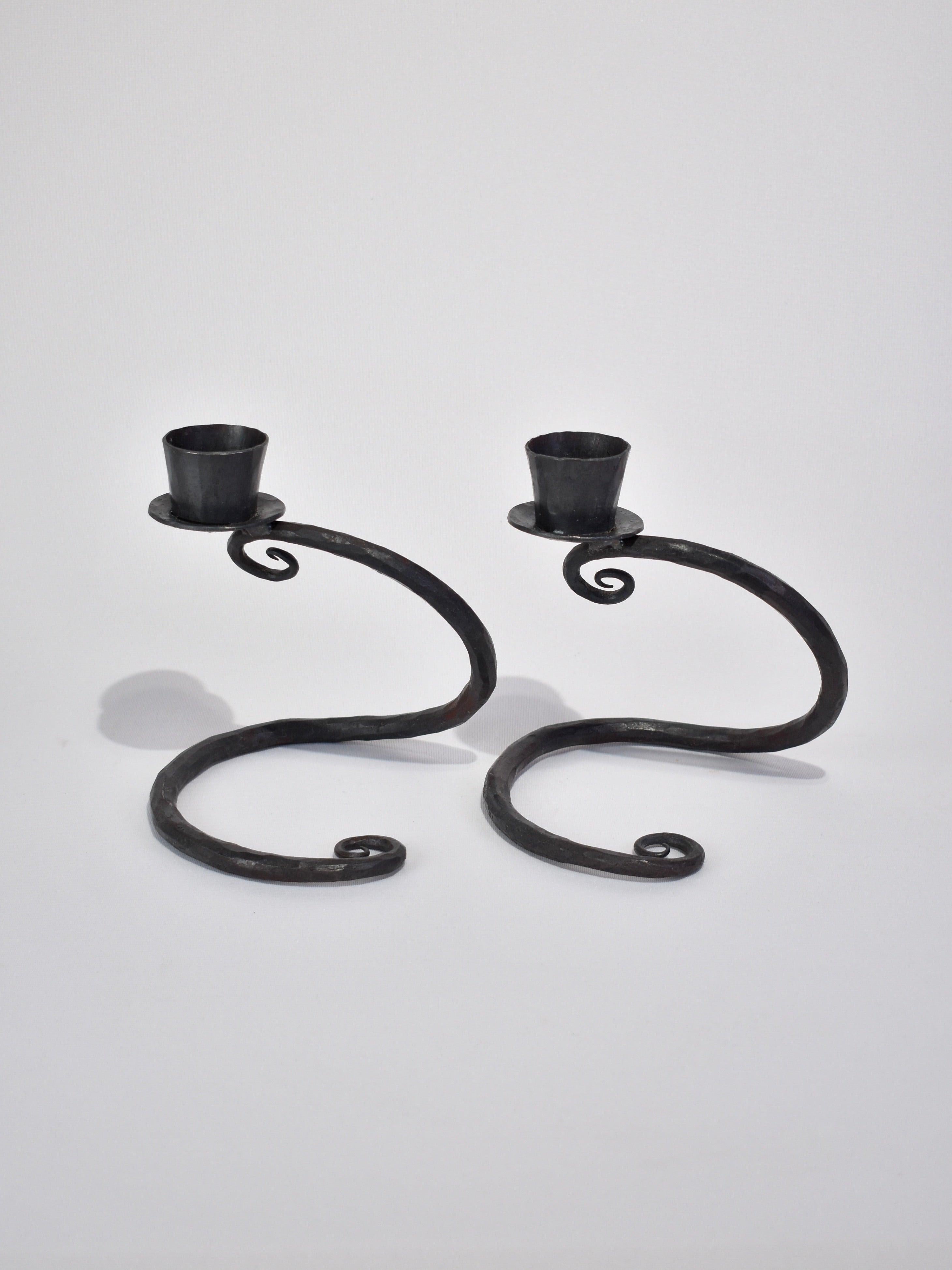 Hand-forged vintage iron candleholders with spiral detail, set of two.