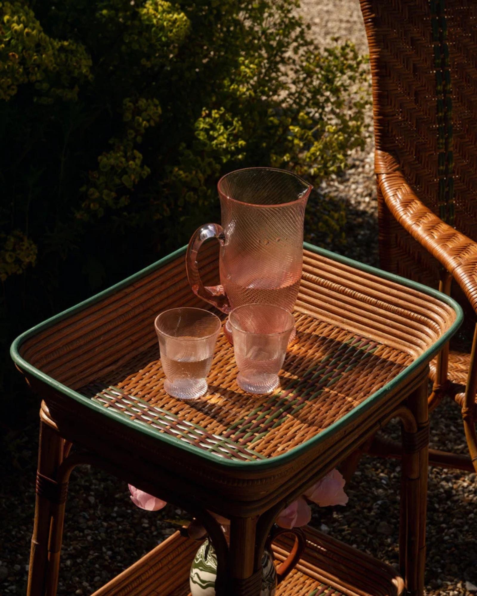 An elegant statement pitcher for the table, our Spiral water jug is handmade and comes in three colourways: Peony Pink, Light Blue and Chestnut Brown. Also available, matching tumblers and wine glasses.