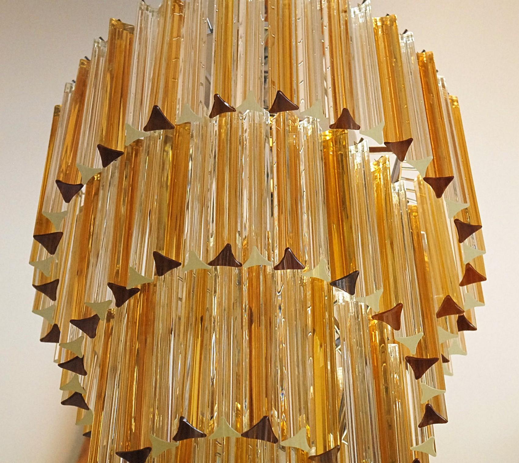 Late 20th Century Spiral tall triedri chandelier, Amber and clear, two available 1980s