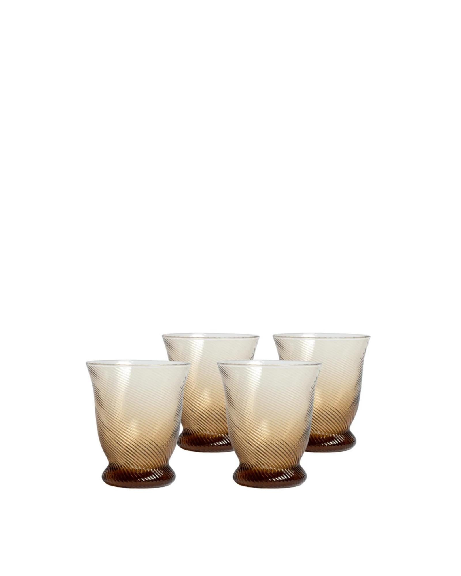 Our Spiral tumblers are handmade and delicate; a beautiful addition to your bar cart. Available in Peony Pink, Light Blue and Chestnut Brown, along with matching wine glasses and jugs. 