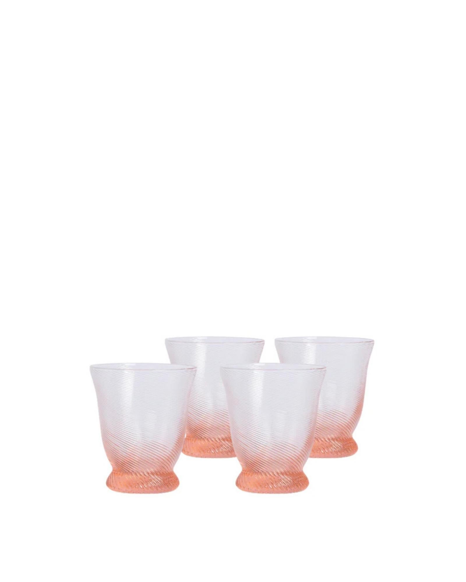 Our Spiral tumblers are handmade and delicate; a beautiful addition to your bar cart. Available in Peony Pink, Light Blue and Chestnut Brown, along with matching wine glasses and jugs. 
