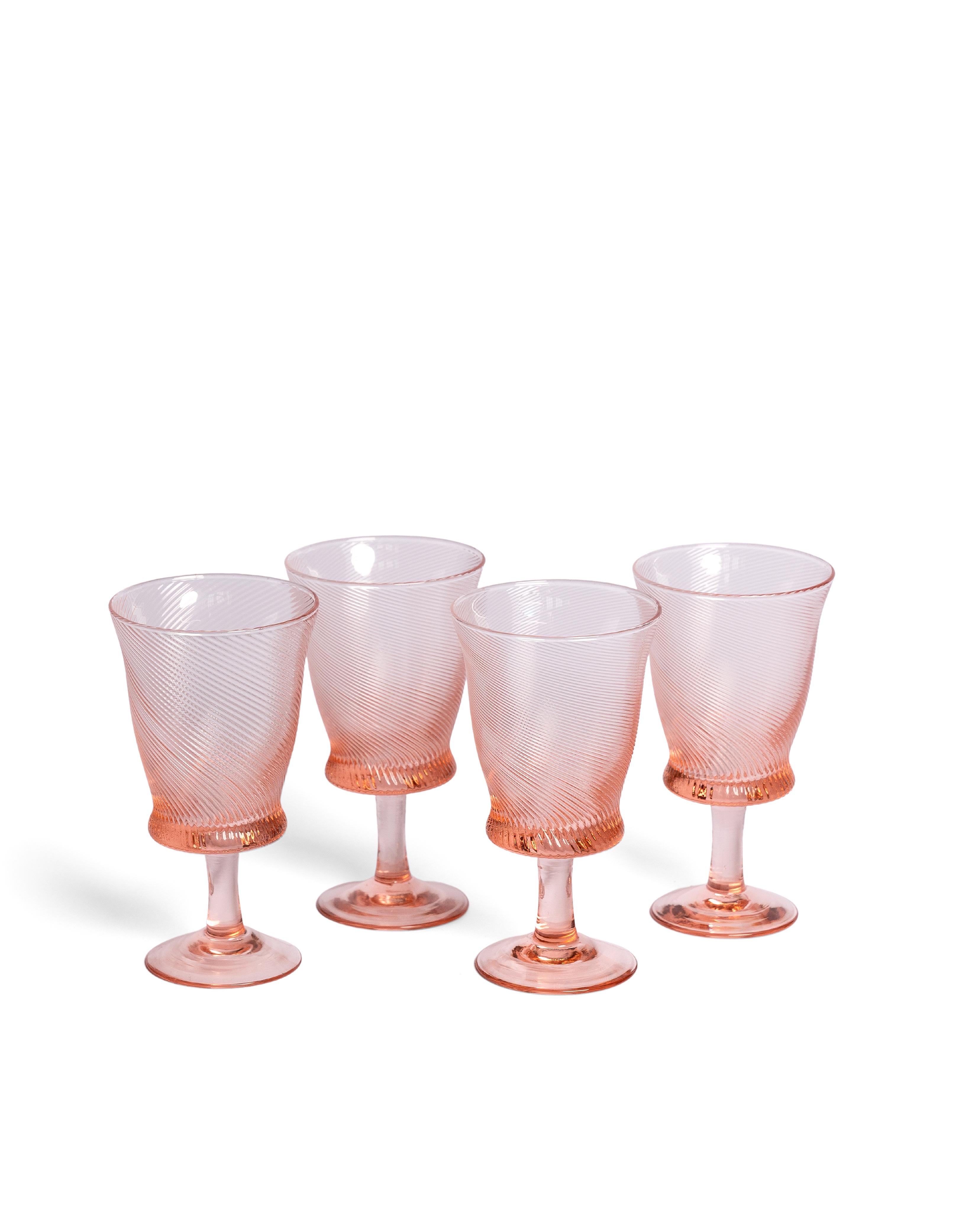 Our Spiral wine glasses are mouth-blown by artisans, creating an elegant pattern. Available in Peony Pink, Light Blue and Chestnut Brown, also browse our matching tumblers and jugs.