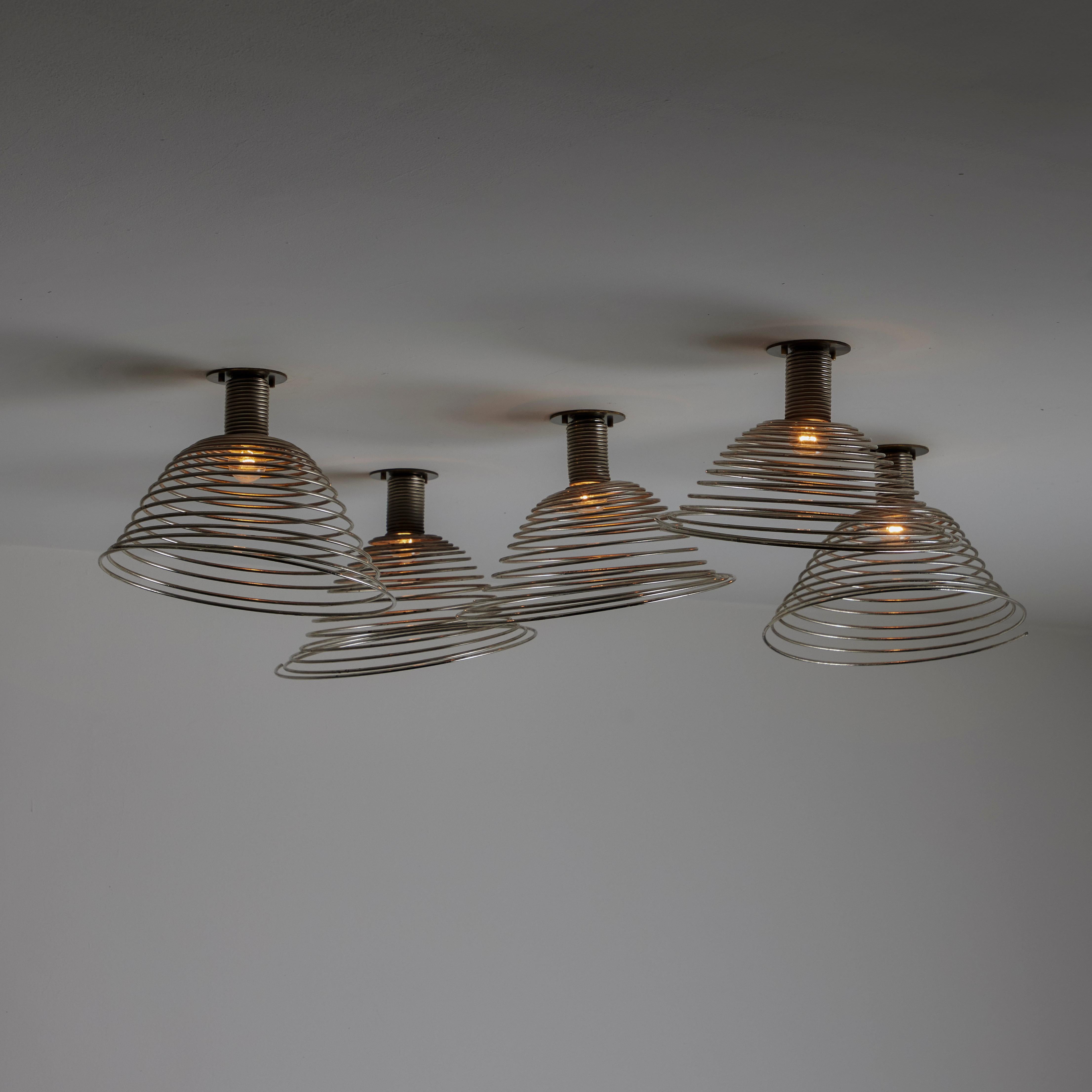 'Spirali' Ceiling or Wall Lights by Angelo Mangiarotti for Candle, Italy, 1960s. Spring steel spiral detail. Strong patina and age to the formations. All flush mounts obtain a particular angle. Each light has a single E27 socket type, adapted for US