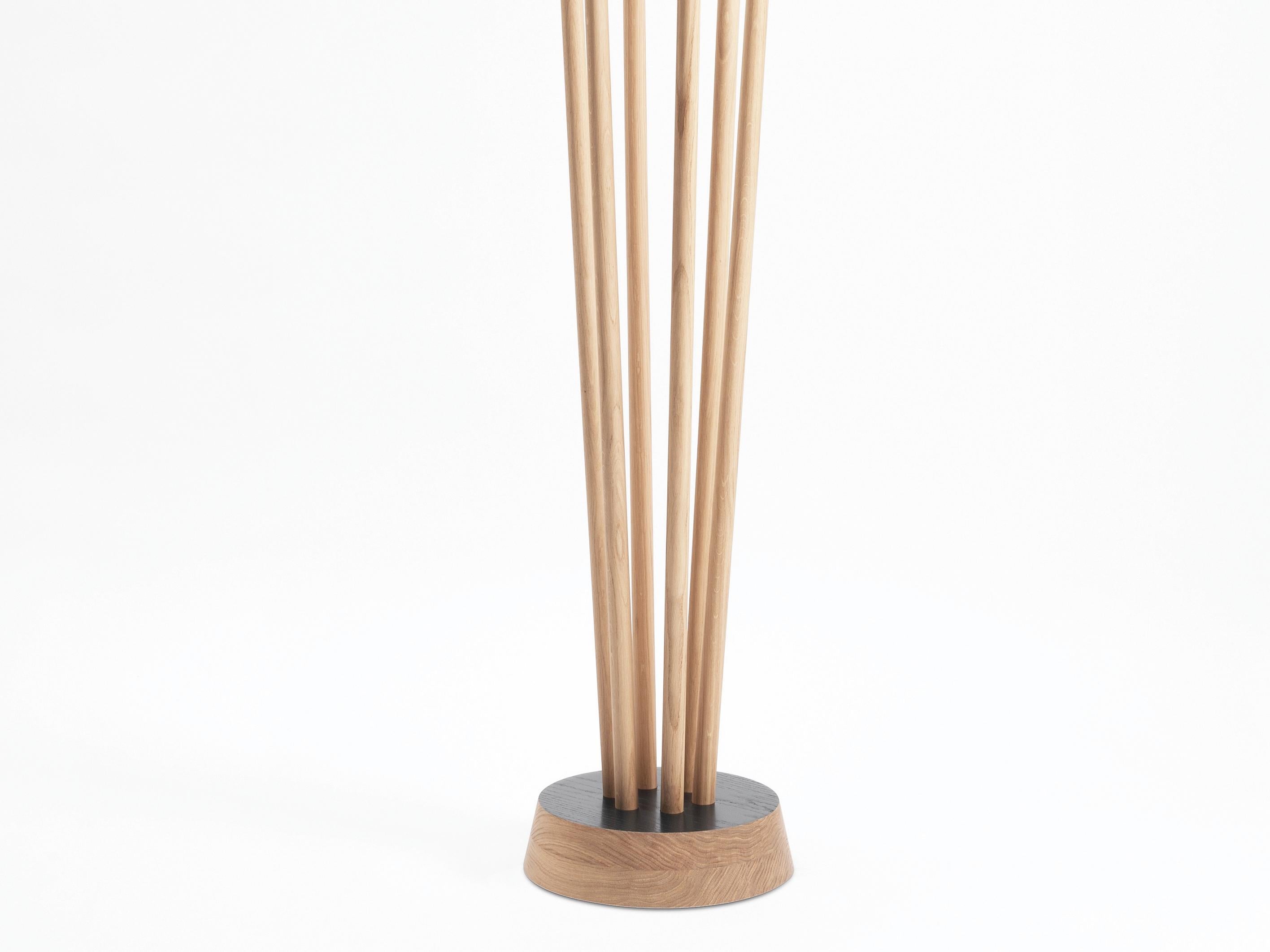 Strongly anchored in a solid wood base, offering different levels, the 6 masts of the Spirale coat rack create an elegant and quirky figure. More than just a coat rack it is a decorative sculpture for an entrance, a hall.
The color of the base can