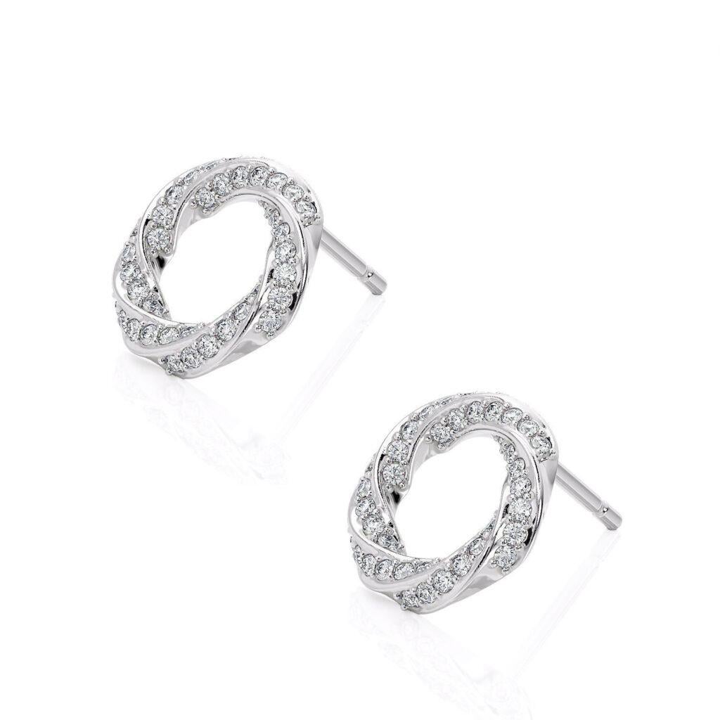 Product Details: 

Presenting our Spiralle Stud Earrings—an exquisite blend of contemporary refinement and artistic ingenuity. These earrings boast a unique spiral-inspired motif, elevating the classic stud design with captivating allure and modern