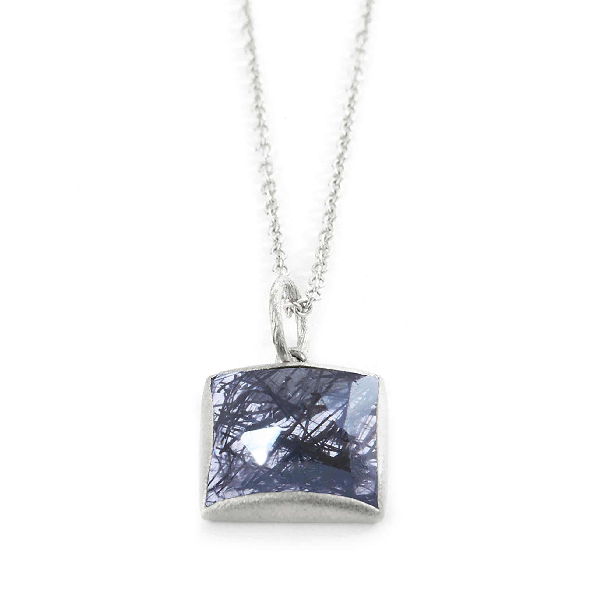 Uplift your look: Designed with a square-shaped black tourmalated quartz pendant, the Spirit Silver Necklace goes with everything in your close

Metal: Sterling Silver
Stone carat: 4.2
Length: 16-18''
Stone size: 10mm

About The Stones:
Genuine