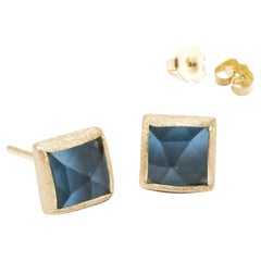 Spirit London Clous d'oreilles en or 18 carats et topaze bleue