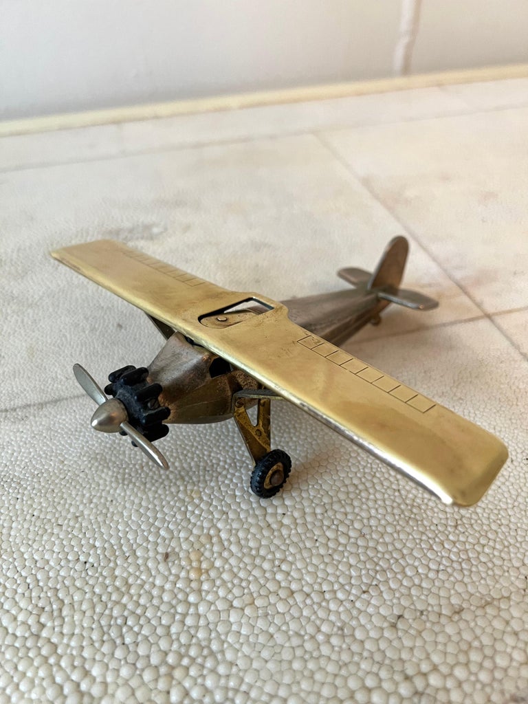 airplane cigarette lighter Spirit of St. Louis Brass Airplane 420 Cigarette Lighter Signed Swank at  1stDibs
