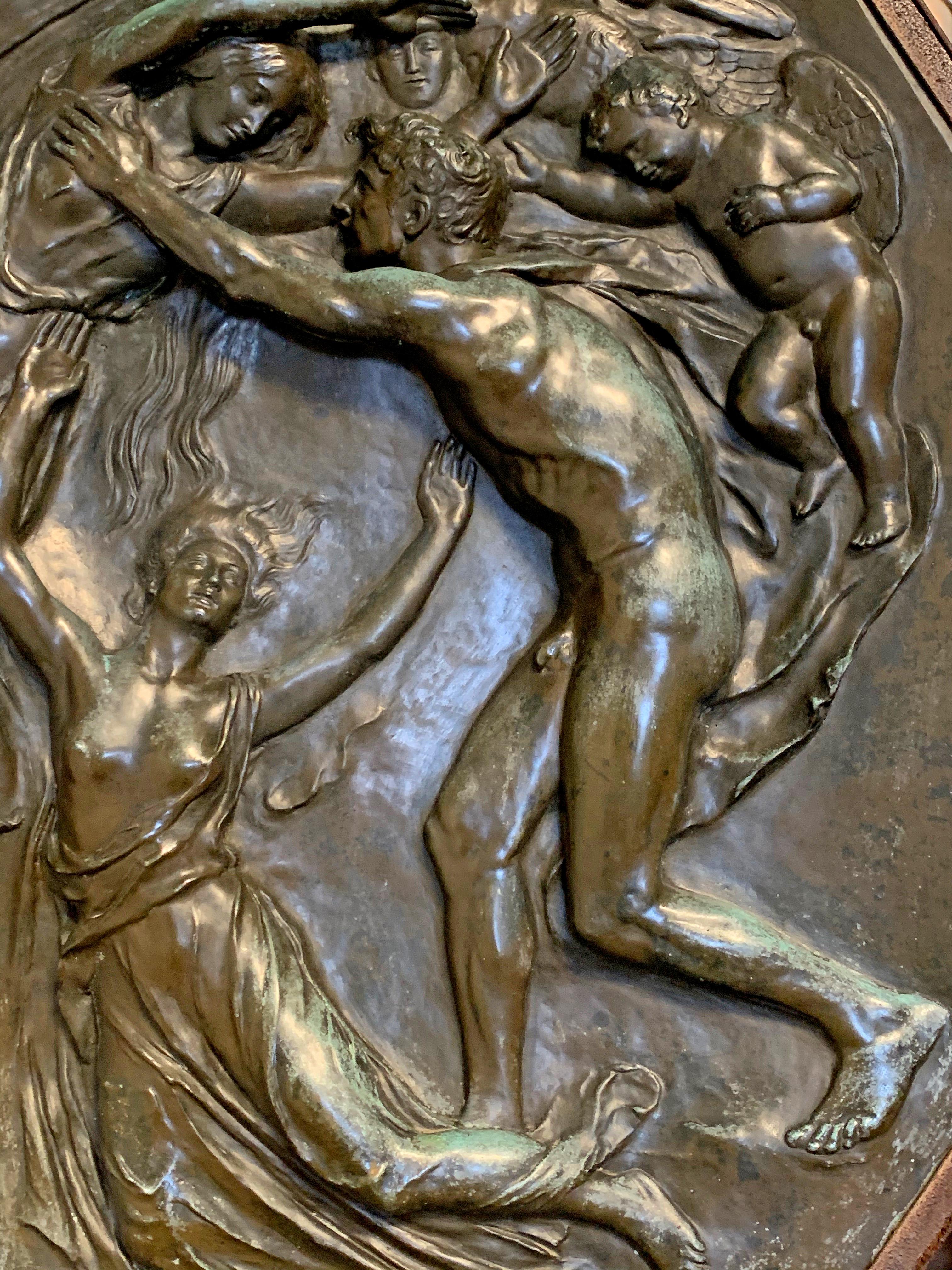 Demonstrating his mastery of allegorical subjects and the nude figure, this large octagonal sculptural bronze panel, featuring a nude male figure reaching out to constrain the rising spirit of his expired love, was created by Henry Alfred Pegram,