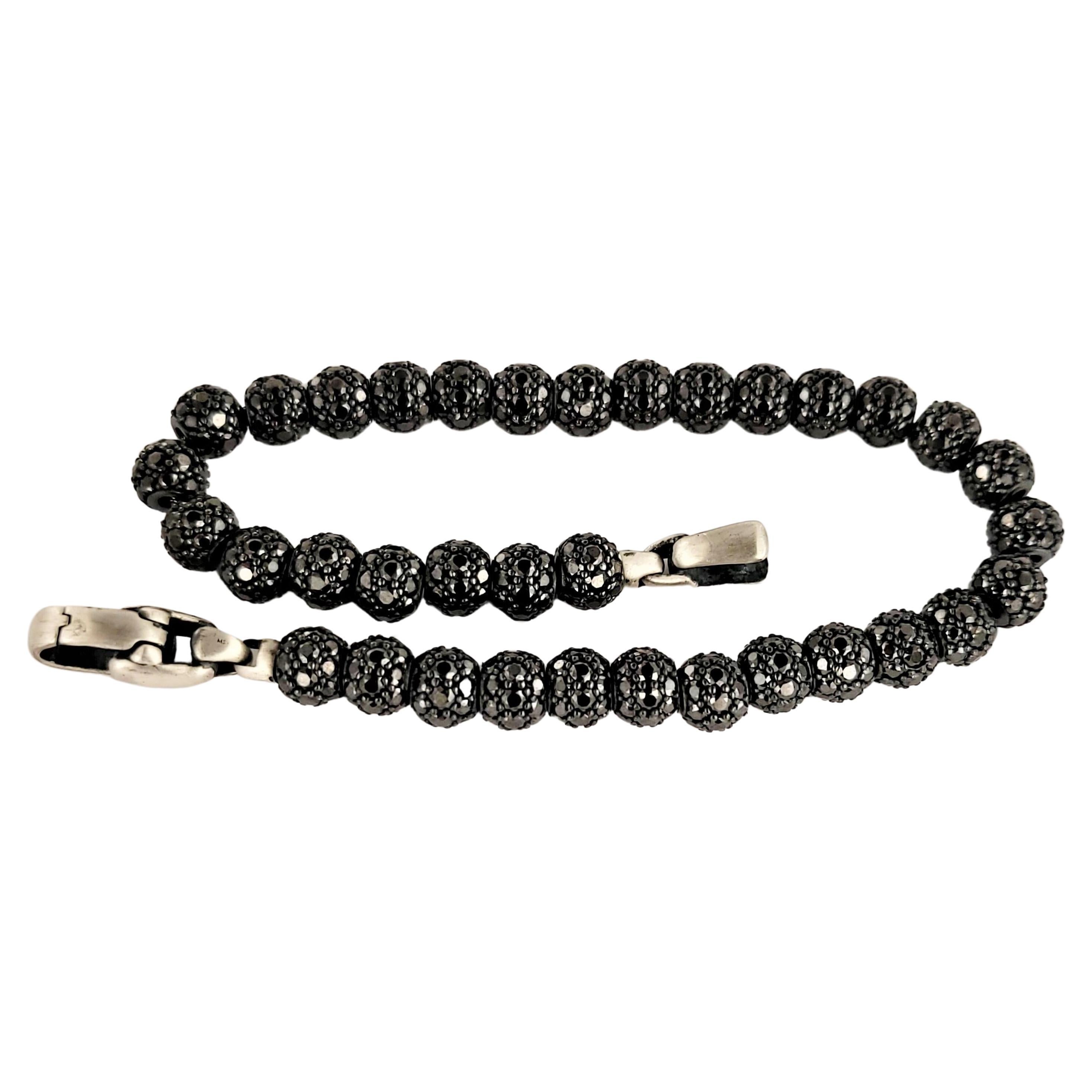 David Yurman Spiritual Beaded Bracelet
Collection For Men 
Material Sterling Silver925
Pave-set black diamonds, 15.95 total carat weight
Bracelet  width 6mm
Bracelet Length 8.5'' Long 
Bracelet Weight 28.4gr 
Condition New, never worn
Retail Price