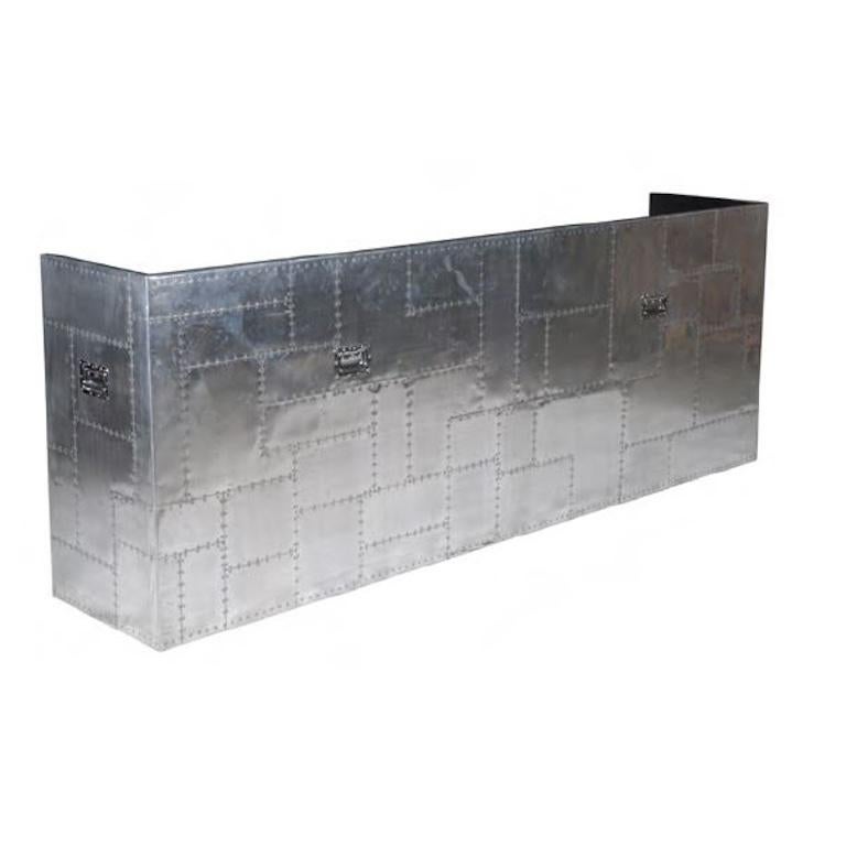 Made by Timothy Oulton. Purcahsed from Charles Wilson

A seriously stylish bar clad in our signature Spitfire finish, inspired by the iconic British Supermarine Spitfire. Mimicking the plane’s riveted exterior, aluminium panels are painstaking