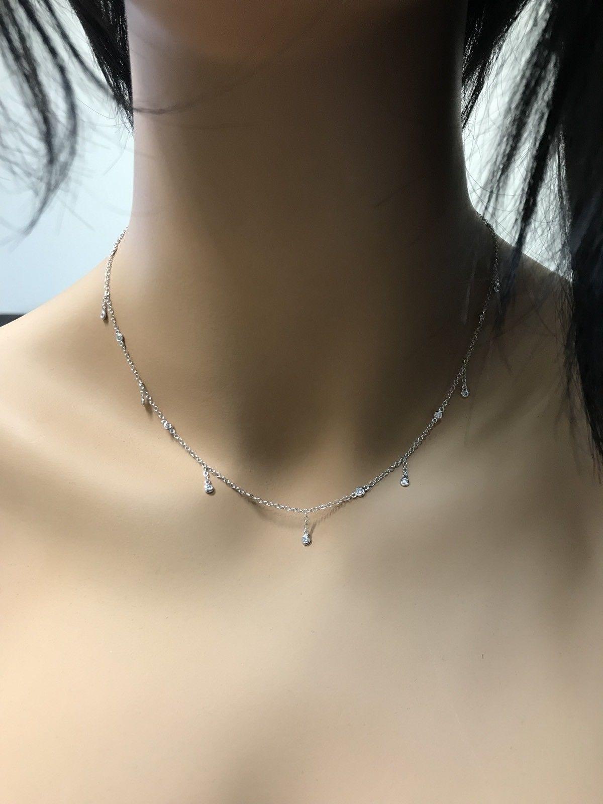 Splendid 14k Solid White Gold Chain Necklace

Amazing looking piece! 

Stamped: 14k

Total Diamond Weight is: Approx. 0.45 Carats (G-H / SI1)

Chain Length is: 16 inches

Total item weight is: 2.7 grams

Disclaimer: all weights, measurements and