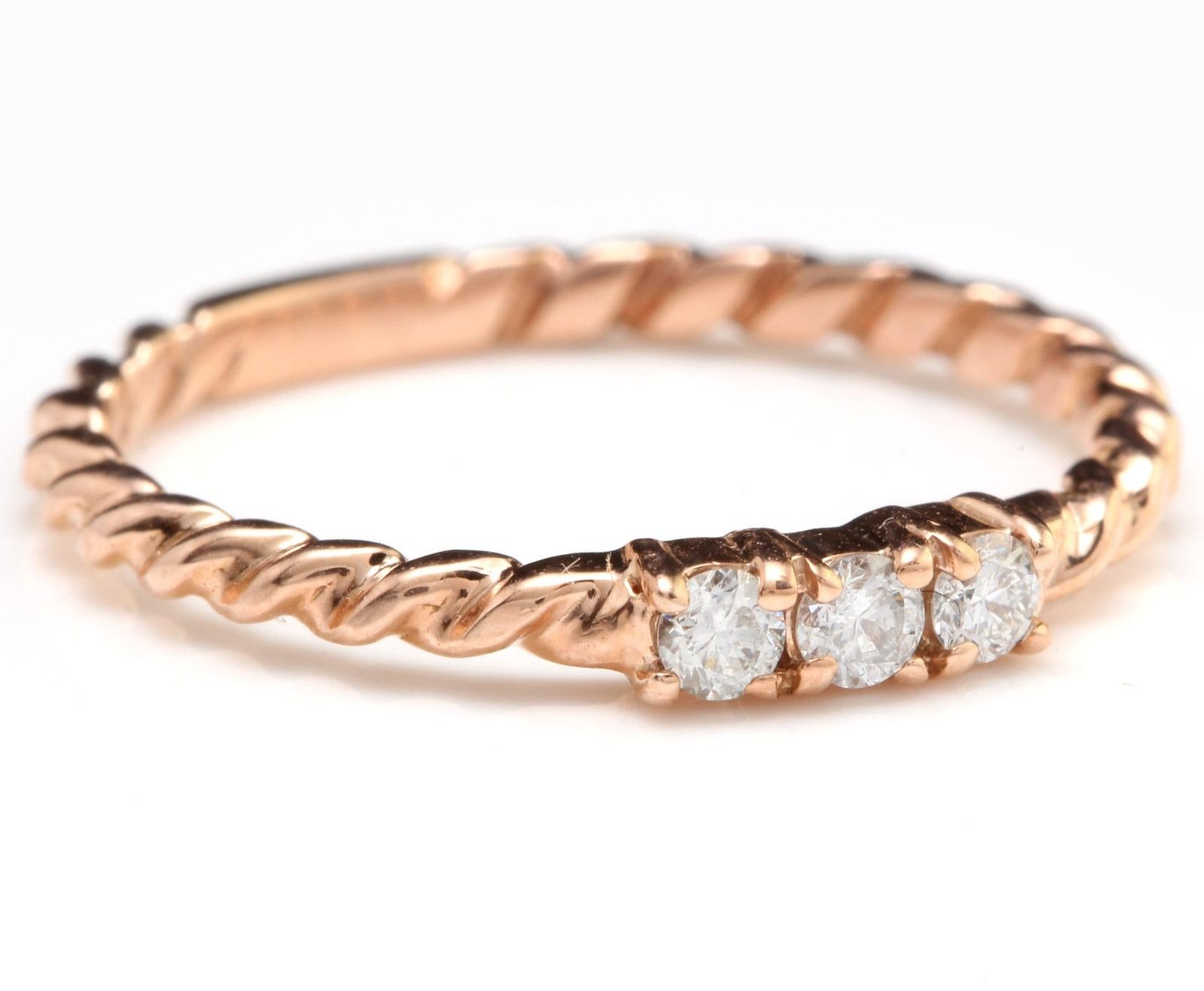 Splendid .15 Carats Natural Diamond 14K Solid Rose Gold Ring

Stamped: 14K

Total Natural Round Cut Diamonds Weight: Approx. 0.15 Carats (color G-H / Clarity SI1-SI2)

The width of the ring is: 2.8mm

Ring size: 7 (we offer free re-sizing upon
