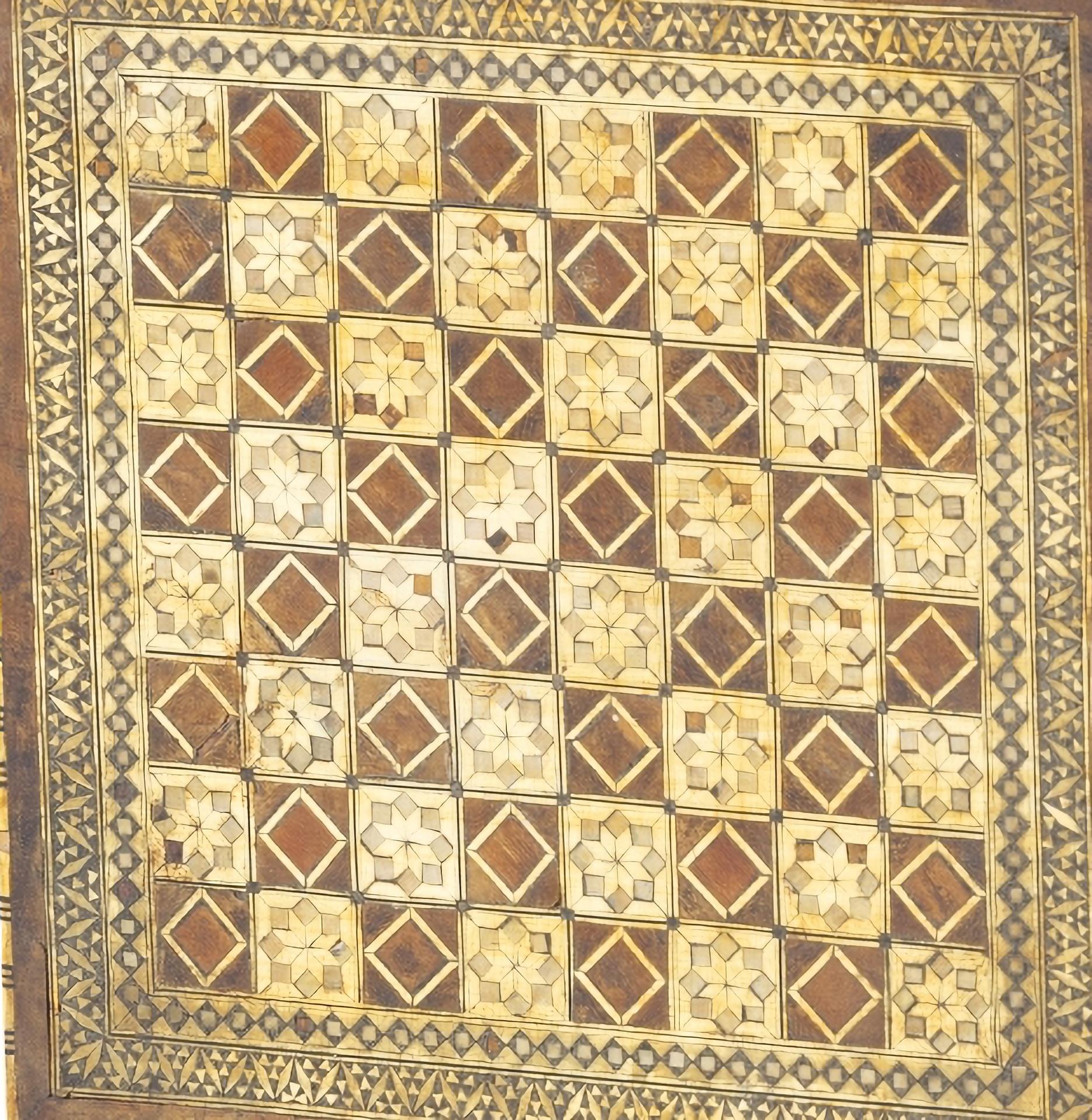 19th Century CHESS BOARD TABLE

in ebony wood with bone applications.
Small flaws.
good condition
Dim.: 52.5 x 37.5 cm.