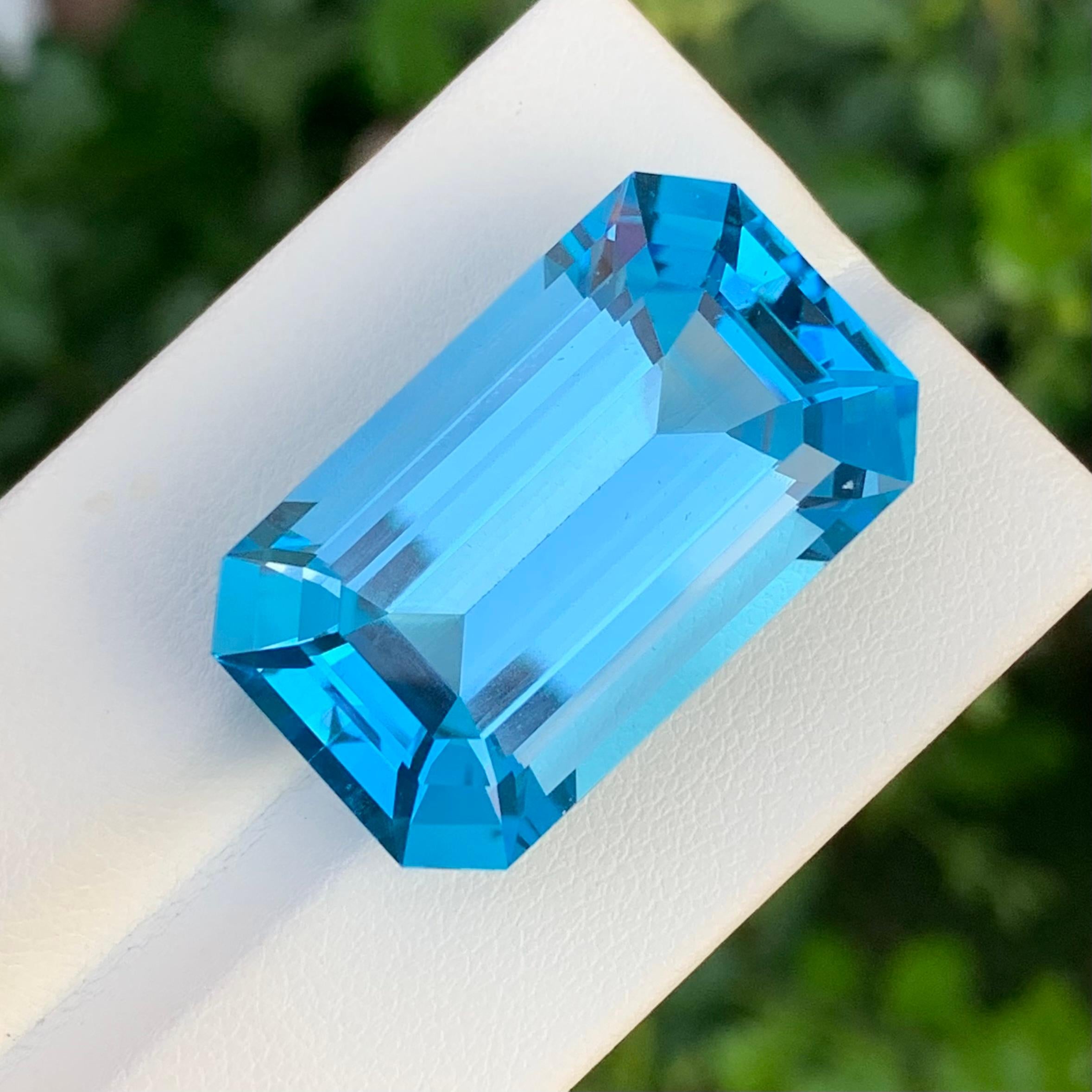 Faceted Swiss Blue Topaz

Weight: 51.35 Carats
Dimension: 28 x 16 x 11.8 Mm
Colour : Blue
Shape: Emerald 
Origin: Brazil

Swiss blue topaz is a vibrant, light blue gemstone known for its striking clarity and brilliance. It is a variety of topaz,