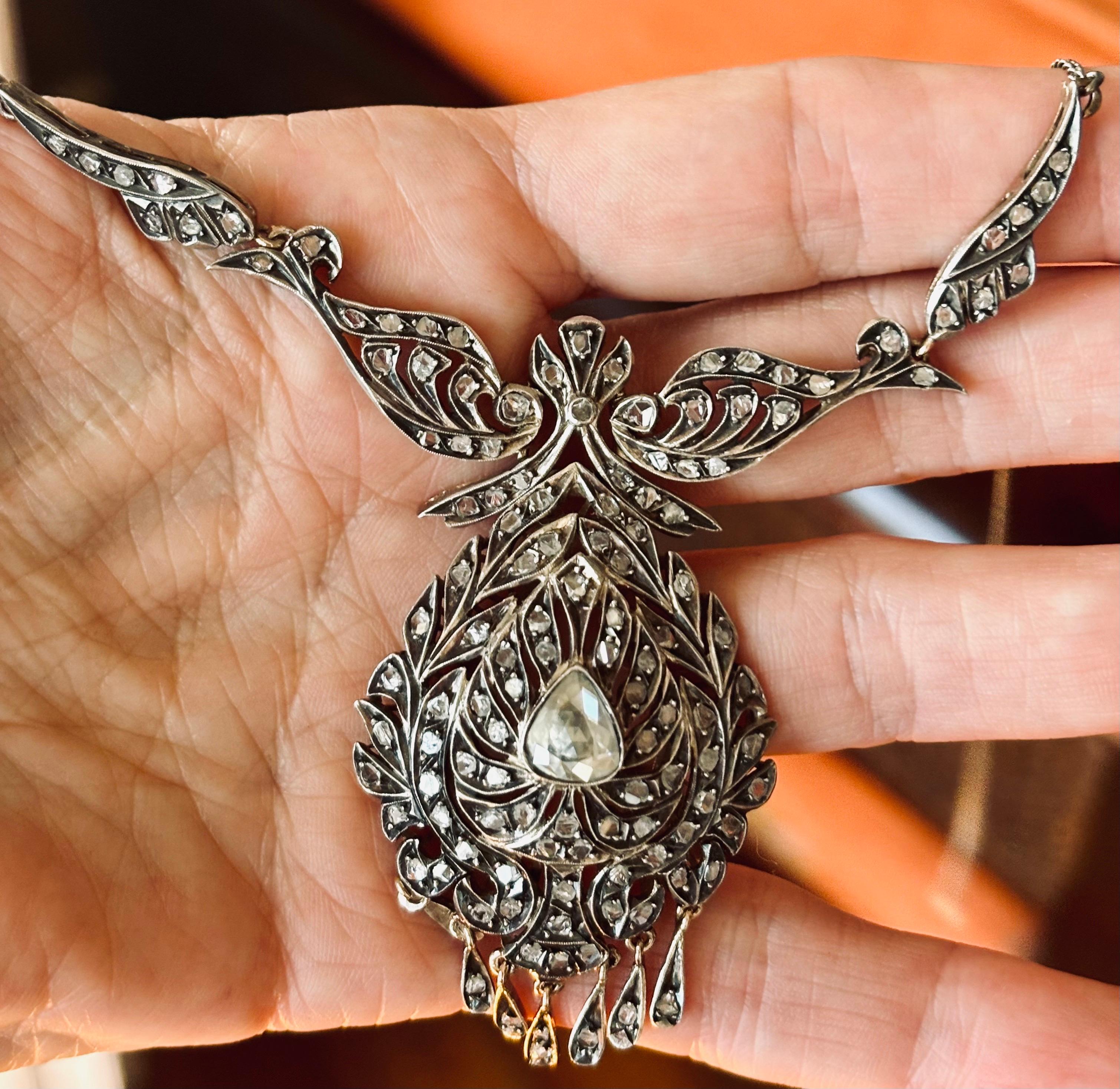 Splendid and exotic drop necklace consisting of a central pear cut diamond of 1,90 carats in addition to 136 rose-cut diamonds. Antique, Victorian period (19th century, 1870). Mounted in silver over rose gold, classic piece of antique jewellery.