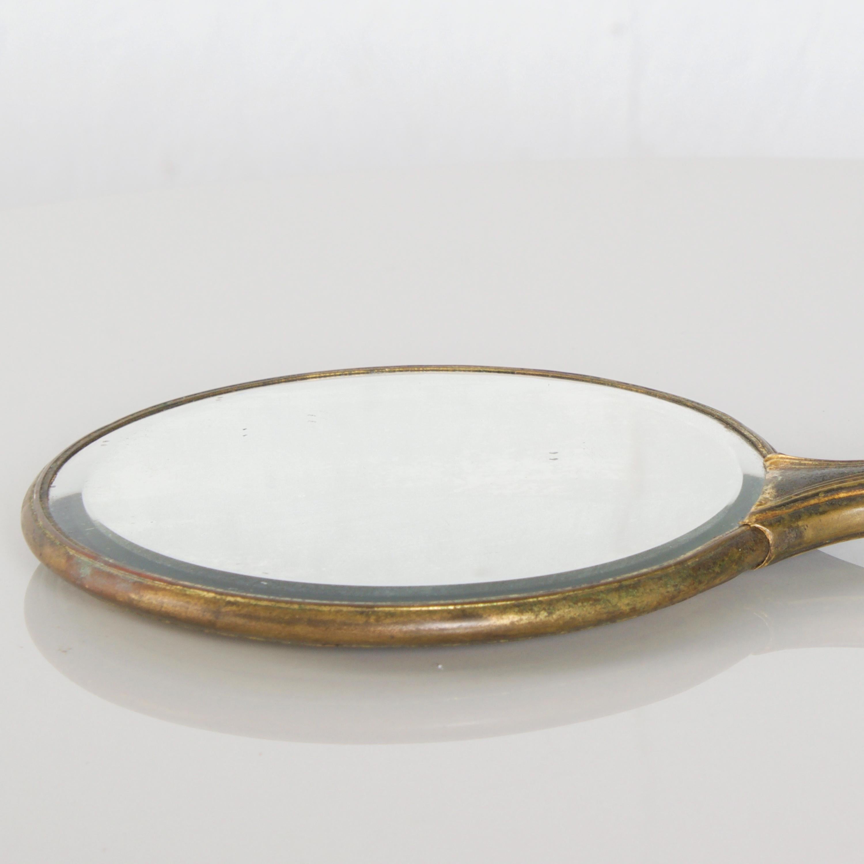 antique brass hand mirror