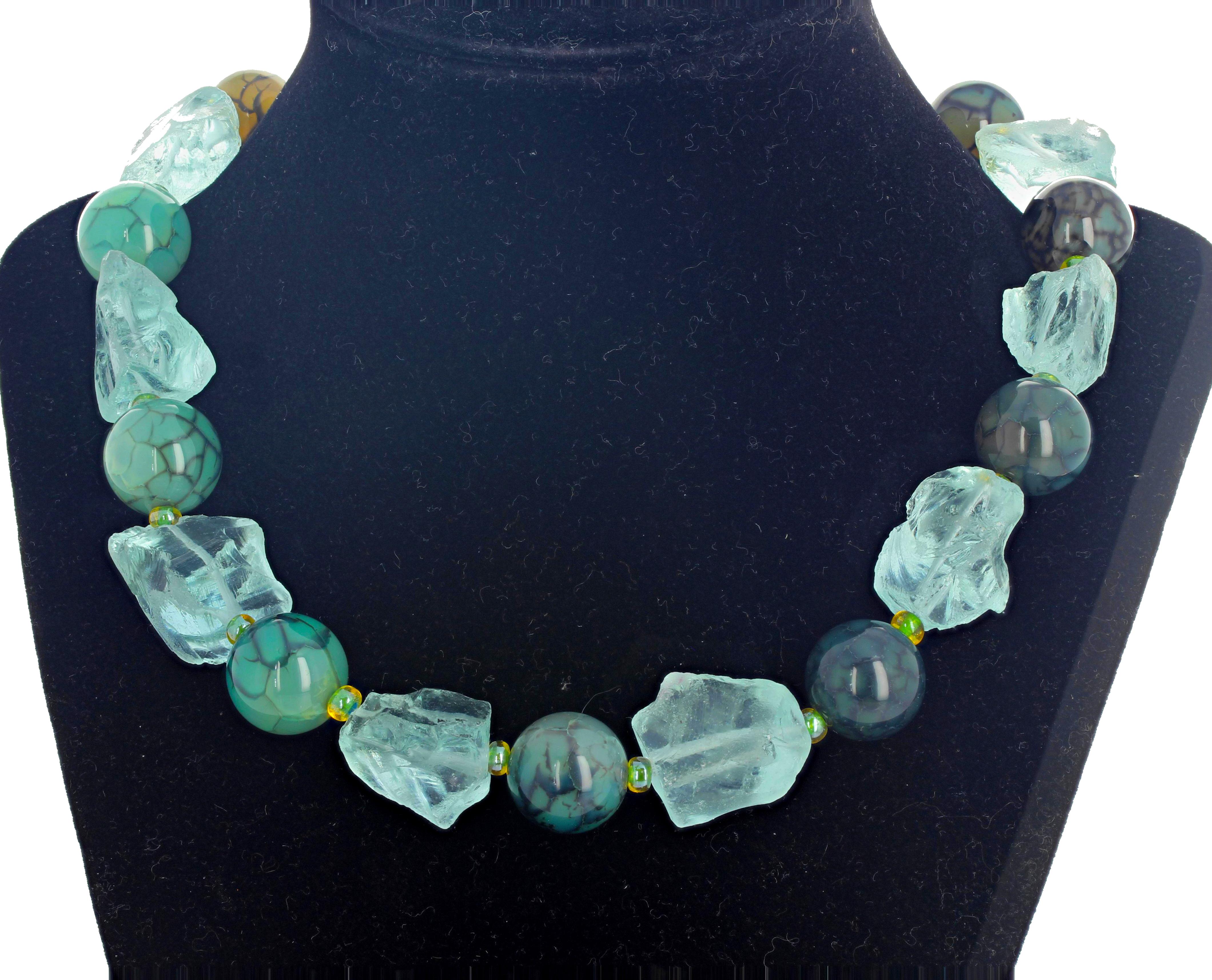 Gorgeous elegant exquisite unique glistening blue chunks of natural real Aquamarines from the famous mine in Brazil enhanced with glowing greenishblue slightly translucent Spiderweb Jasper set in a 17.5 inch long necklace with silvery hook clasp. 