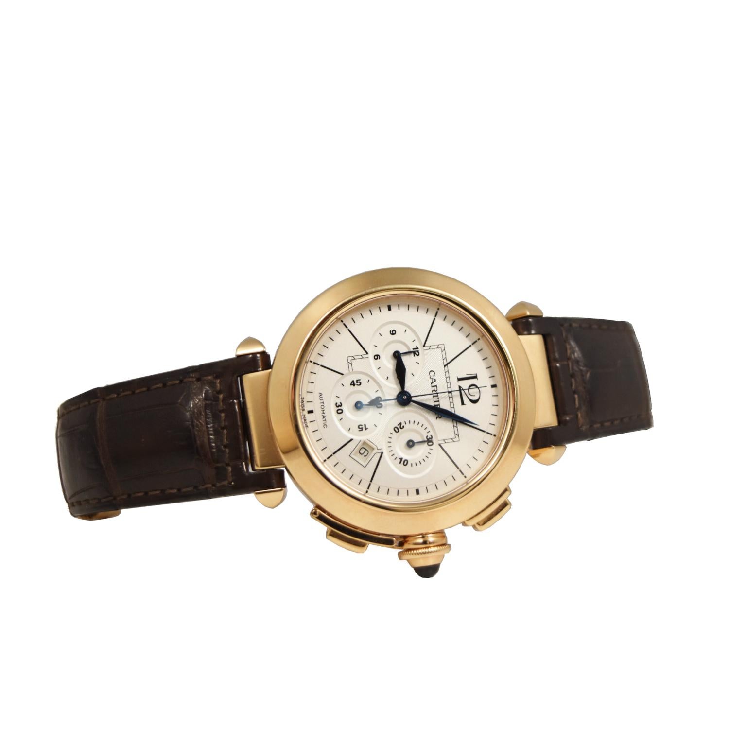 Inspired by one of its wristwatch from 1943, Cartier created the Pasha series which turned out to be the perfect combination of power and elegance, with its round case, four Arabic numerals and sword-shaped hands. This model features a 41mm 18k Rose