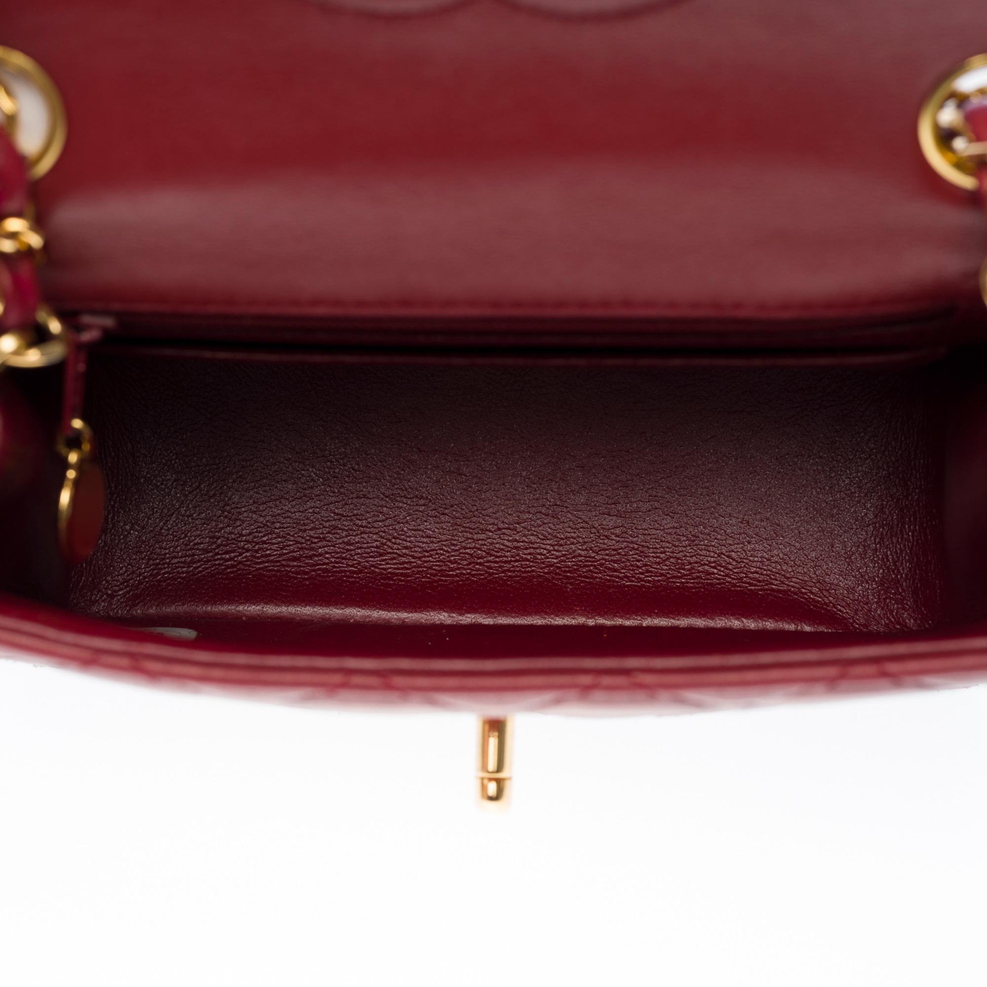 Women's Splendid Chanel Timeless Mini flap bag in burgundy quilted leather, GHW