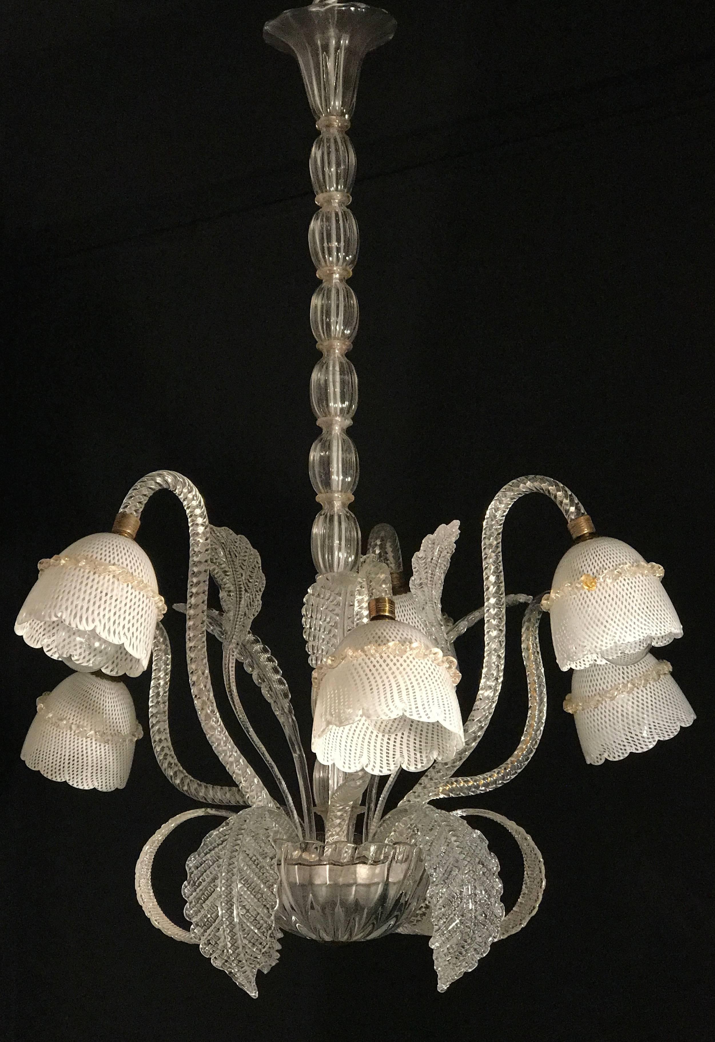 Exquisite craftsmanship with six arms supporting handblown 'reticello' cups. Perfect vintage condition.
We can rewire for US standards. Six e27 light bulbs.