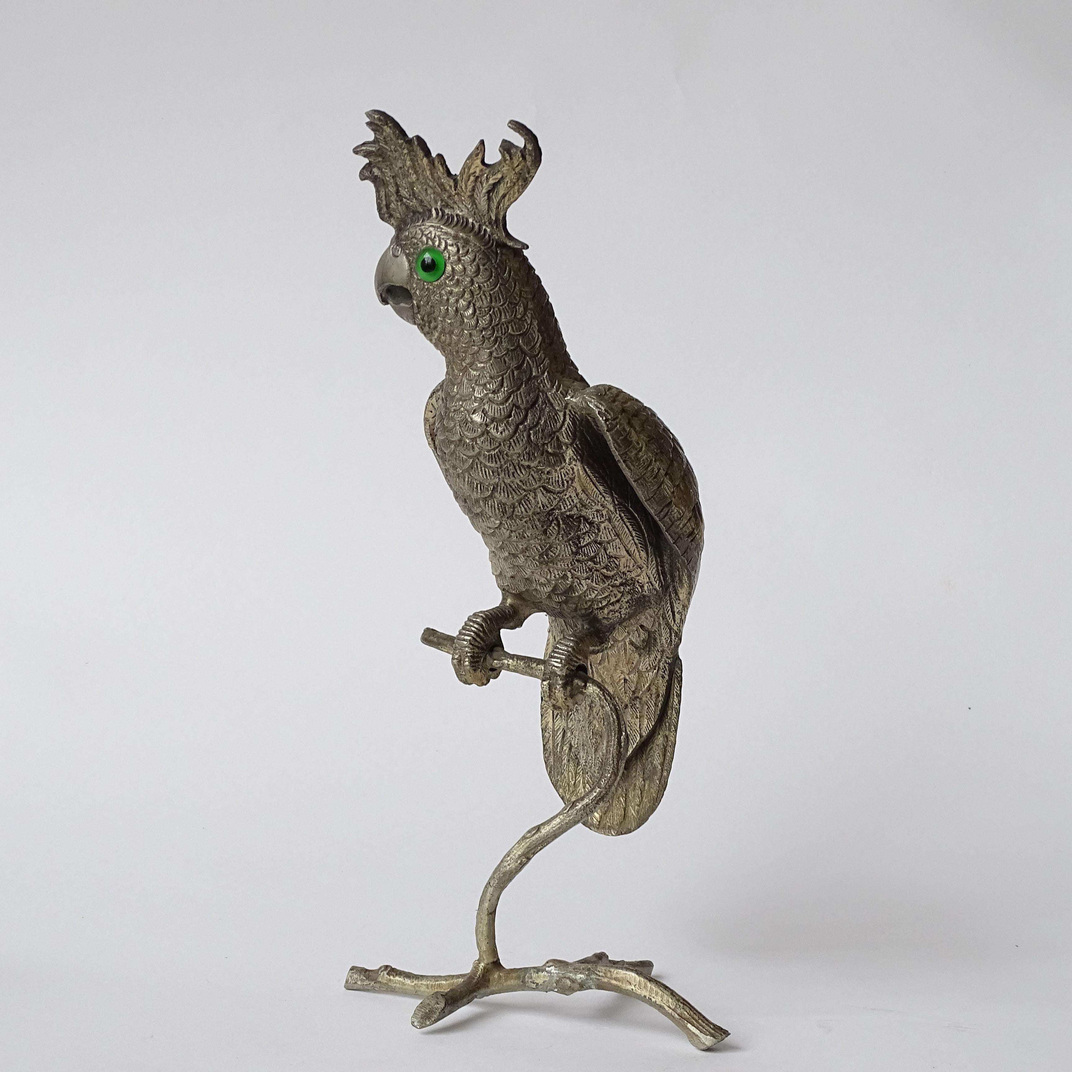 Splendid Italian Nickeled Brass Parrot on a Branch Sculpture, 1970s
Nickeled brass and Green glass eyes.