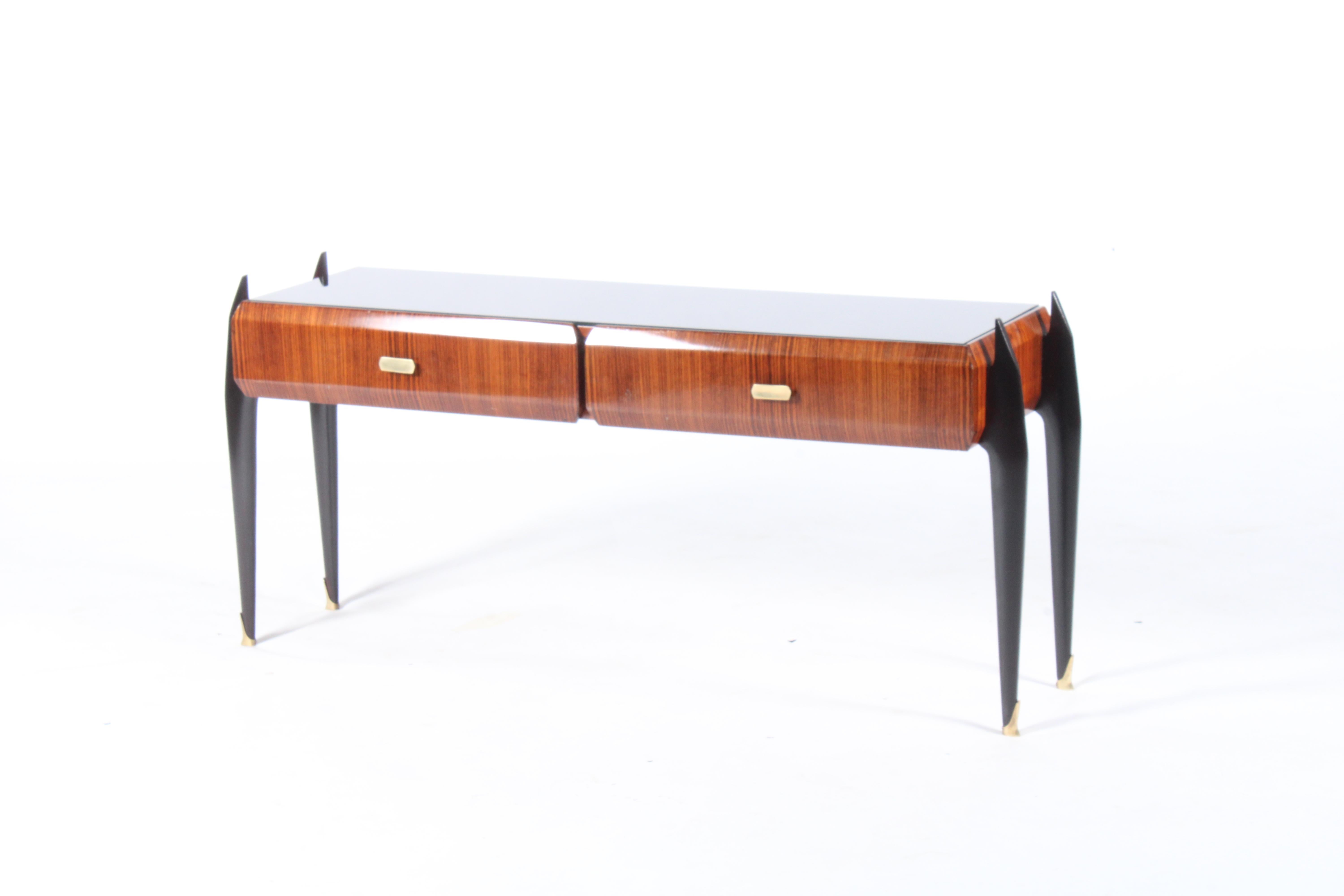 This striking original piece dating from the 1950's works wonderfully well as a low console table but in our opinion could easily double up as a TV stand or media unit. Sourced in the beautiful city of Turin from a private home we have replaced the