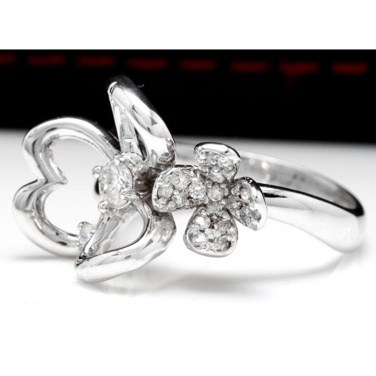 Splendide bague fleur en or blanc massif 14K avec diamant naturel

Estampillé : 14K

Poids total des diamants naturels de taille ronde : Environ 0,40 carats (couleur G-H / Clarté SI1-SI2)

Le poids du diamant central est de : 0.15ct

Le haut de
